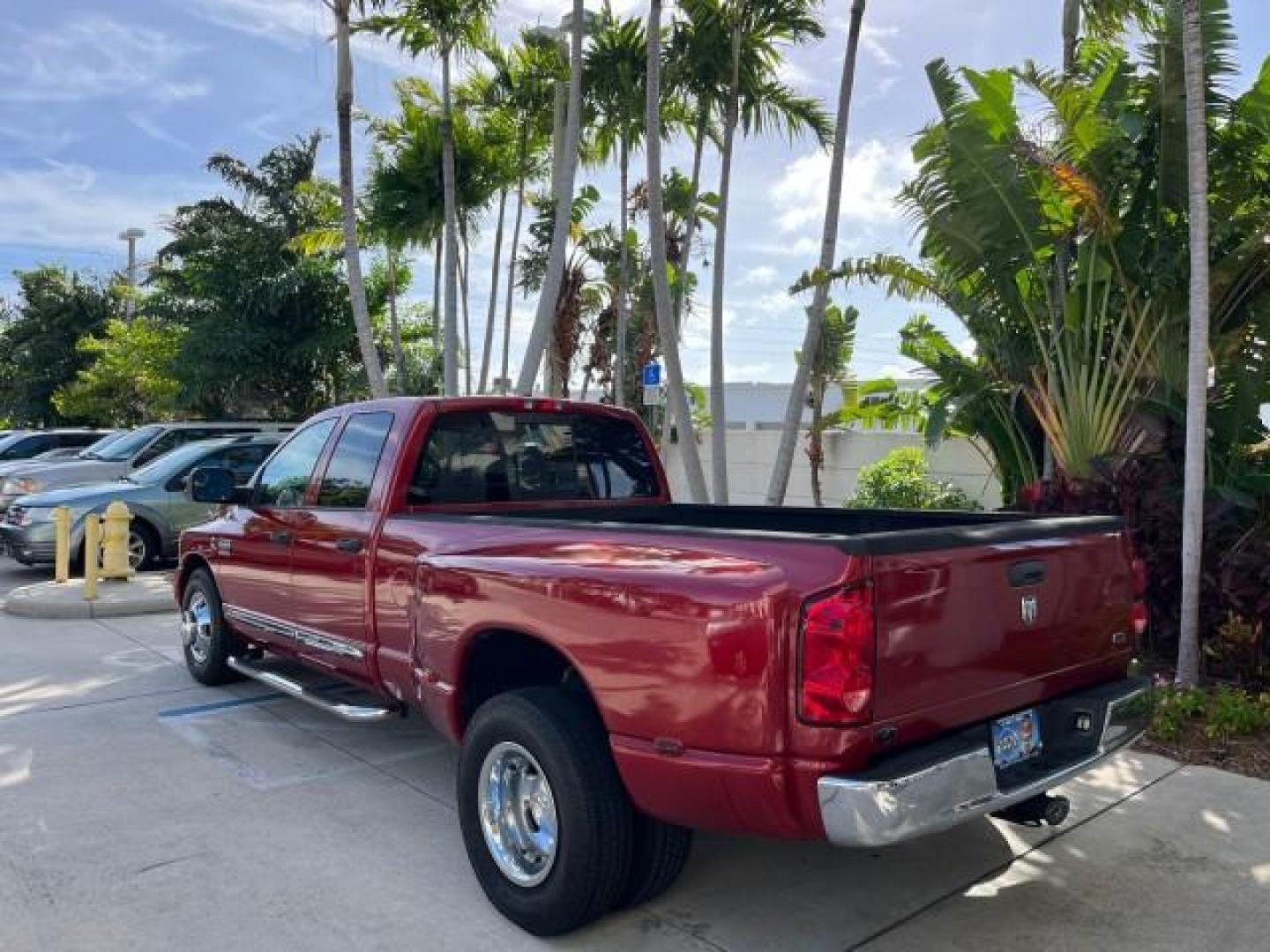 2007 Flame Red /Dark Slate Gray Dodge Ram 3500 1 FL DUALLY 6.7 TURBO DIESEL LO MI 53,485 (3D7ML48A47G) with an 6.7L Straight 6-Cyl Engine engine, Automatic transmission, located at 4701 North Dixie Hwy, Pompano Beach, FL, 33064, (954) 422-2889, 26.240938, -80.123474 - OUR WEBPAGE FLORIDACARS1.COM HAS OVER 100 PHOTOS AND FREE CARFAX LINK 2007 DODGE RAM 3500 ST ROAD READY WORK READY VIN: 3D7ML48A47G841313 NO ACCIDENTS NO RECALLS CREW PICKUP 5TH WHEEL HITCH 1 OWNER FLORIDA 6.7L I6 F LOW MILES 53,485 8,2 FT BED TURBO DIESEL POWER LEATHER SEATS REAR WHEEL DRIVE CUMMIN - Photo#5