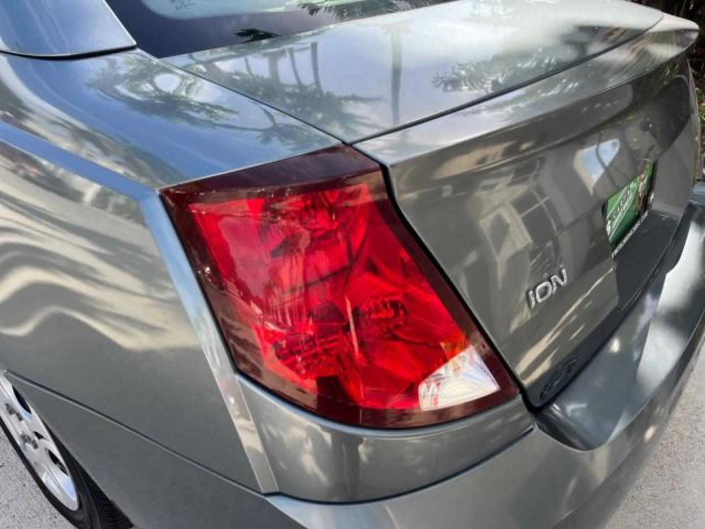 2004 Storm Grey /Grey Saturn Ion FL ION 2 LOW MILES 63,559 (1G8AJ52F64Z) with an 2.2L DOHC SFI 16-Valve I4 Ecotec Engine engine, Automatic transmission, located at 4701 North Dixie Hwy, Pompano Beach, FL, 33064, (954) 422-2889, 26.240938, -80.123474 - OUR WEBPAGE FLORIDACARS1.COM HAS OVER 100 PHOTOS AND FREE CARFAX LINK 2004 SATURN ION 2 ROAD READY 2.2 I4 VIN: 1G8AJ52F64Z163277 FLORIDA OWNER SEDAN 4 DR LOW MILES 63,559 2.2L I4 F DOHC NO ACCIDENTS GASOLINE NO RECALLS FRONT WHEEL DRIVE 32 MPG Approach Lights FWD Front Bucket Seats Rear Headrests St - Photo#99