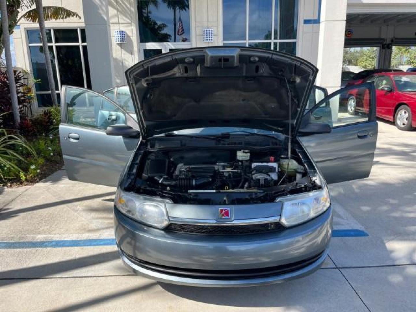 2004 Storm Grey /Grey Saturn Ion FL ION 2 LOW MILES 63,559 (1G8AJ52F64Z) with an 2.2L DOHC SFI 16-Valve I4 Ecotec Engine engine, Automatic transmission, located at 4701 North Dixie Hwy, Pompano Beach, FL, 33064, (954) 422-2889, 26.240938, -80.123474 - OUR WEBPAGE FLORIDACARS1.COM HAS OVER 100 PHOTOS AND FREE CARFAX LINK 2004 SATURN ION 2 ROAD READY 2.2 I4 VIN: 1G8AJ52F64Z163277 FLORIDA OWNER SEDAN 4 DR LOW MILES 63,559 2.2L I4 F DOHC NO ACCIDENTS GASOLINE NO RECALLS FRONT WHEEL DRIVE 32 MPG Approach Lights FWD Front Bucket Seats Rear Headrests St - Photo#16