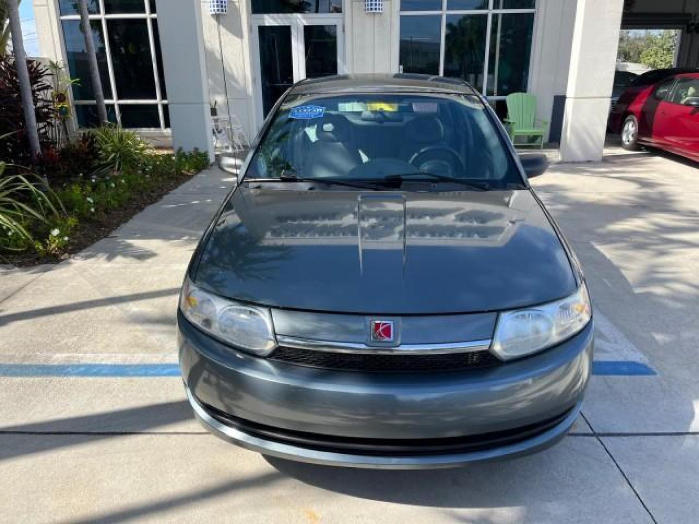 2004 Storm Grey /Grey Saturn Ion FL ION 2 LOW MILES 63,559 (1G8AJ52F64Z) with an 2.2L DOHC SFI 16-Valve I4 Ecotec Engine engine, Automatic transmission, located at 4701 North Dixie Hwy, Pompano Beach, FL, 33064, (954) 422-2889, 26.240938, -80.123474 - OUR WEBPAGE FLORIDACARS1.COM HAS OVER 100 PHOTOS AND FREE CARFAX LINK 2004 SATURN ION 2 ROAD READY 2.2 I4 VIN: 1G8AJ52F64Z163277 FLORIDA OWNER SEDAN 4 DR LOW MILES 63,559 2.2L I4 F DOHC NO ACCIDENTS GASOLINE NO RECALLS FRONT WHEEL DRIVE 32 MPG Approach Lights FWD Front Bucket Seats Rear Headrests St - Photo#69