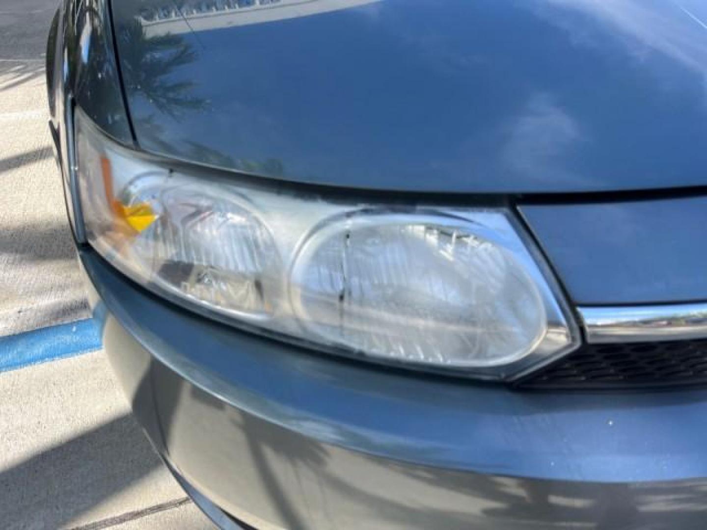 2004 Storm Grey /Grey Saturn Ion FL ION 2 LOW MILES 63,559 (1G8AJ52F64Z) with an 2.2L DOHC SFI 16-Valve I4 Ecotec Engine engine, Automatic transmission, located at 4701 North Dixie Hwy, Pompano Beach, FL, 33064, (954) 422-2889, 26.240938, -80.123474 - OUR WEBPAGE FLORIDACARS1.COM HAS OVER 100 PHOTOS AND FREE CARFAX LINK 2004 SATURN ION 2 ROAD READY 2.2 I4 VIN: 1G8AJ52F64Z163277 FLORIDA OWNER SEDAN 4 DR LOW MILES 63,559 2.2L I4 F DOHC NO ACCIDENTS GASOLINE NO RECALLS FRONT WHEEL DRIVE 32 MPG Approach Lights FWD Front Bucket Seats Rear Headrests St - Photo#74