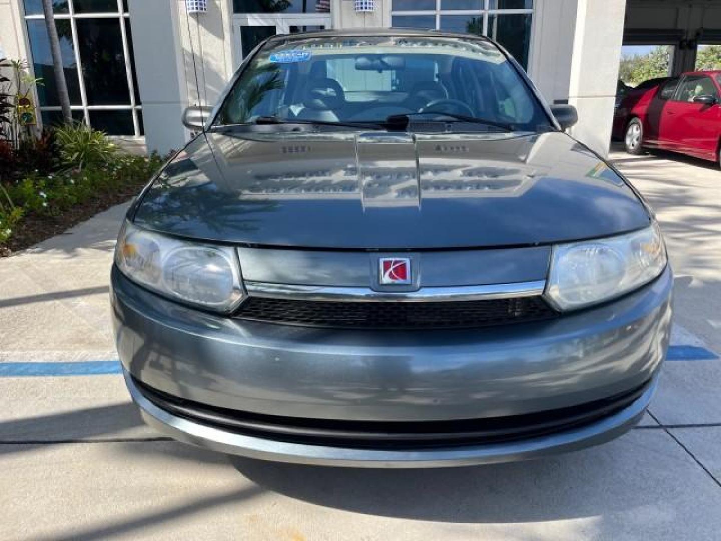 2004 Storm Grey /Grey Saturn Ion FL ION 2 LOW MILES 63,559 (1G8AJ52F64Z) with an 2.2L DOHC SFI 16-Valve I4 Ecotec Engine engine, Automatic transmission, located at 4701 North Dixie Hwy, Pompano Beach, FL, 33064, (954) 422-2889, 26.240938, -80.123474 - OUR WEBPAGE FLORIDACARS1.COM HAS OVER 100 PHOTOS AND FREE CARFAX LINK 2004 SATURN ION 2 ROAD READY 2.2 I4 VIN: 1G8AJ52F64Z163277 FLORIDA OWNER SEDAN 4 DR LOW MILES 63,559 2.2L I4 F DOHC NO ACCIDENTS GASOLINE NO RECALLS FRONT WHEEL DRIVE 32 MPG Approach Lights FWD Front Bucket Seats Rear Headrests St - Photo#76