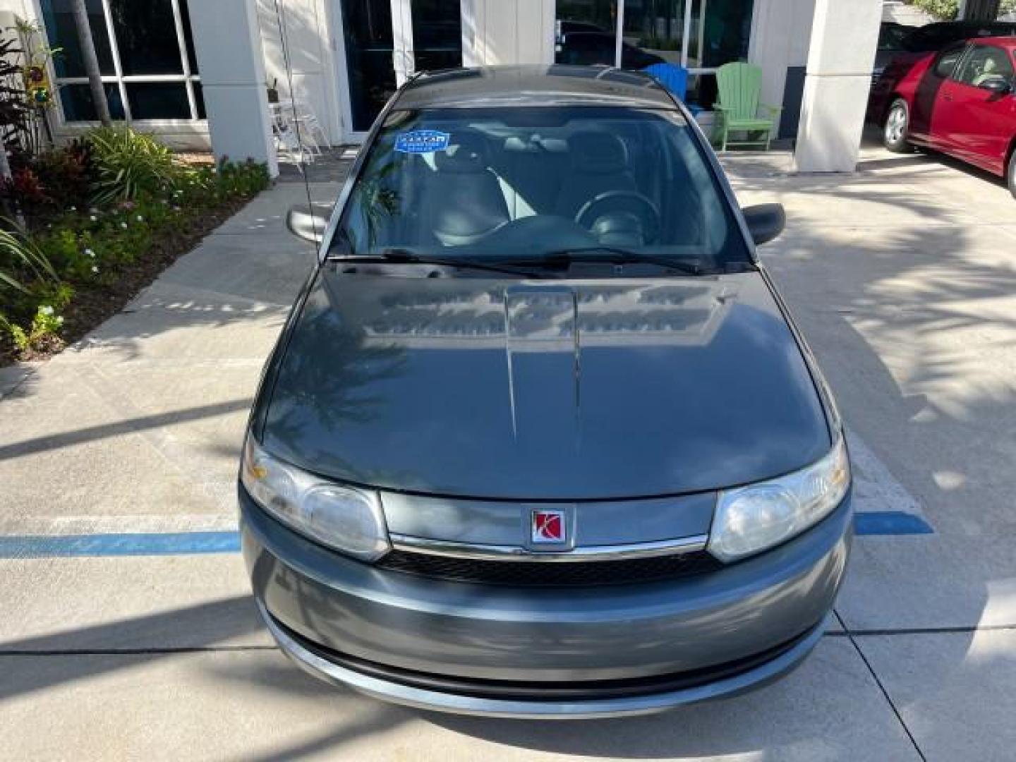 2004 Storm Grey /Grey Saturn Ion FL ION 2 LOW MILES 63,559 (1G8AJ52F64Z) with an 2.2L DOHC SFI 16-Valve I4 Ecotec Engine engine, Automatic transmission, located at 4701 North Dixie Hwy, Pompano Beach, FL, 33064, (954) 422-2889, 26.240938, -80.123474 - OUR WEBPAGE FLORIDACARS1.COM HAS OVER 100 PHOTOS AND FREE CARFAX LINK 2004 SATURN ION 2 ROAD READY 2.2 I4 VIN: 1G8AJ52F64Z163277 FLORIDA OWNER SEDAN 4 DR LOW MILES 63,559 2.2L I4 F DOHC NO ACCIDENTS GASOLINE NO RECALLS FRONT WHEEL DRIVE 32 MPG Approach Lights FWD Front Bucket Seats Rear Headrests St - Photo#77