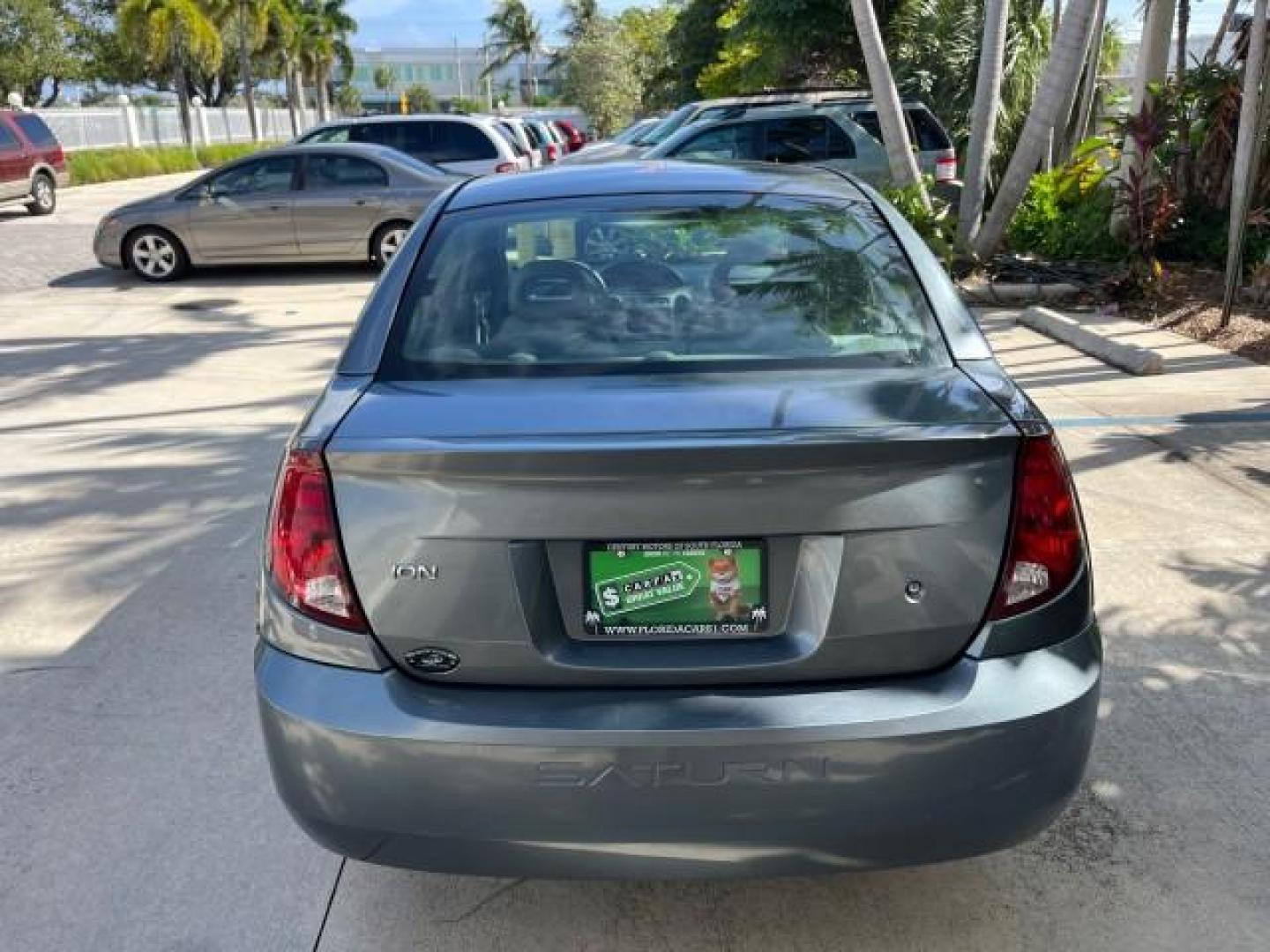 2004 Storm Grey /Grey Saturn Ion FL ION 2 LOW MILES 63,559 (1G8AJ52F64Z) with an 2.2L DOHC SFI 16-Valve I4 Ecotec Engine engine, Automatic transmission, located at 4701 North Dixie Hwy, Pompano Beach, FL, 33064, (954) 422-2889, 26.240938, -80.123474 - OUR WEBPAGE FLORIDACARS1.COM HAS OVER 100 PHOTOS AND FREE CARFAX LINK 2004 SATURN ION 2 ROAD READY 2.2 I4 VIN: 1G8AJ52F64Z163277 FLORIDA OWNER SEDAN 4 DR LOW MILES 63,559 2.2L I4 F DOHC NO ACCIDENTS GASOLINE NO RECALLS FRONT WHEEL DRIVE 32 MPG Approach Lights FWD Front Bucket Seats Rear Headrests St - Photo#89