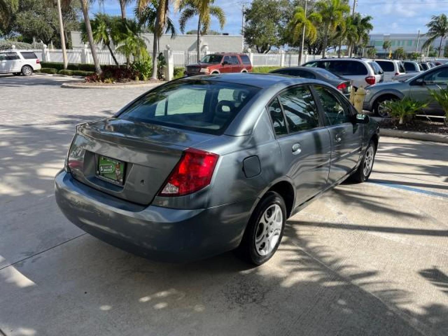 2004 Storm Grey /Grey Saturn Ion FL ION 2 LOW MILES 63,559 (1G8AJ52F64Z) with an 2.2L DOHC SFI 16-Valve I4 Ecotec Engine engine, Automatic transmission, located at 4701 North Dixie Hwy, Pompano Beach, FL, 33064, (954) 422-2889, 26.240938, -80.123474 - OUR WEBPAGE FLORIDACARS1.COM HAS OVER 100 PHOTOS AND FREE CARFAX LINK 2004 SATURN ION 2 ROAD READY 2.2 I4 VIN: 1G8AJ52F64Z163277 FLORIDA OWNER SEDAN 4 DR LOW MILES 63,559 2.2L I4 F DOHC NO ACCIDENTS GASOLINE NO RECALLS FRONT WHEEL DRIVE 32 MPG Approach Lights FWD Front Bucket Seats Rear Headrests St - Photo#90