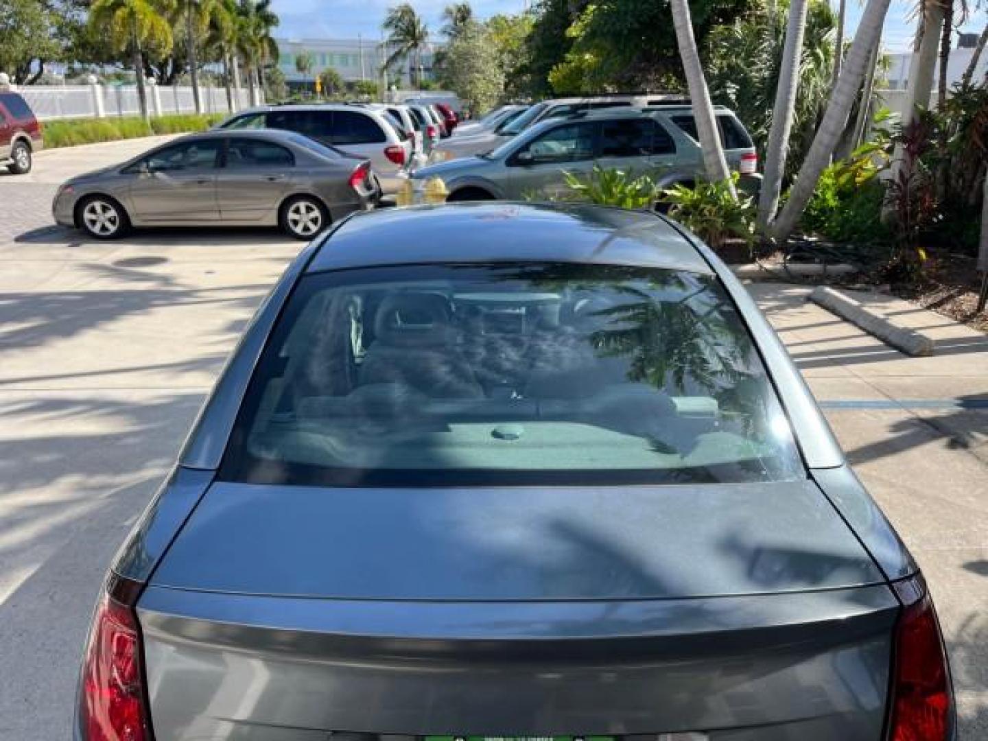 2004 Storm Grey /Grey Saturn Ion FL ION 2 LOW MILES 63,559 (1G8AJ52F64Z) with an 2.2L DOHC SFI 16-Valve I4 Ecotec Engine engine, Automatic transmission, located at 4701 North Dixie Hwy, Pompano Beach, FL, 33064, (954) 422-2889, 26.240938, -80.123474 - OUR WEBPAGE FLORIDACARS1.COM HAS OVER 100 PHOTOS AND FREE CARFAX LINK 2004 SATURN ION 2 ROAD READY 2.2 I4 VIN: 1G8AJ52F64Z163277 FLORIDA OWNER SEDAN 4 DR LOW MILES 63,559 2.2L I4 F DOHC NO ACCIDENTS GASOLINE NO RECALLS FRONT WHEEL DRIVE 32 MPG Approach Lights FWD Front Bucket Seats Rear Headrests St - Photo#94