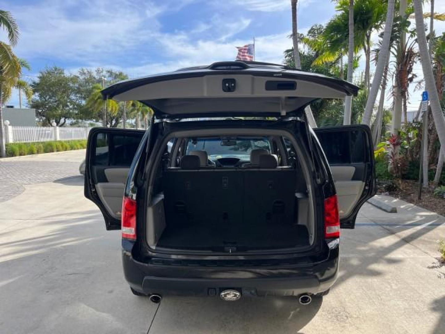 2011 Crystal Black Pearl /Gray Honda Pilot 1 FL EX-L LOW MILES 58,977 (5FNYF3H55BB) with an 3.5L SOHC MPFI 24-Valve i-VTEC V6 Engine engine, Automatic transmission, located at 4701 North Dixie Hwy, Pompano Beach, FL, 33064, (954) 422-2889, 26.240938, -80.123474 - OUR WEBPAGE FLORIDACARS1.COM HAS OVER 100 PHOTOS AND FREE CARFAX LINK 2011 HONDA PILOT EX-L ROAD READY 3.5L V6 VIN: 5FNYF3H55BB047158 NO ACCIDENTS NO RECALLS 4 DOOR WAGON/SPORT UTILITY 1 OWNER FLORIDA 3.5L V6 F SOHC 24V DUAL AC LOW MILES 58,977 GASOLINE 3 ROW SEATS POWER LEATHER SEATS FRONT WHEEL DR - Photo#14