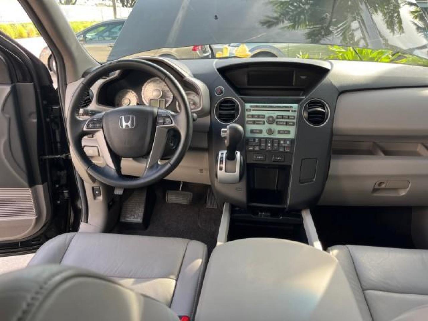 2011 Crystal Black Pearl /Gray Honda Pilot 1 FL EX-L LOW MILES 58,977 (5FNYF3H55BB) with an 3.5L SOHC MPFI 24-Valve i-VTEC V6 Engine engine, Automatic transmission, located at 4701 North Dixie Hwy, Pompano Beach, FL, 33064, (954) 422-2889, 26.240938, -80.123474 - OUR WEBPAGE FLORIDACARS1.COM HAS OVER 100 PHOTOS AND FREE CARFAX LINK 2011 HONDA PILOT EX-L ROAD READY 3.5L V6 VIN: 5FNYF3H55BB047158 NO ACCIDENTS NO RECALLS 4 DOOR WAGON/SPORT UTILITY 1 OWNER FLORIDA 3.5L V6 F SOHC 24V DUAL AC LOW MILES 58,977 GASOLINE 3 ROW SEATS POWER LEATHER SEATS FRONT WHEEL DR - Photo#45