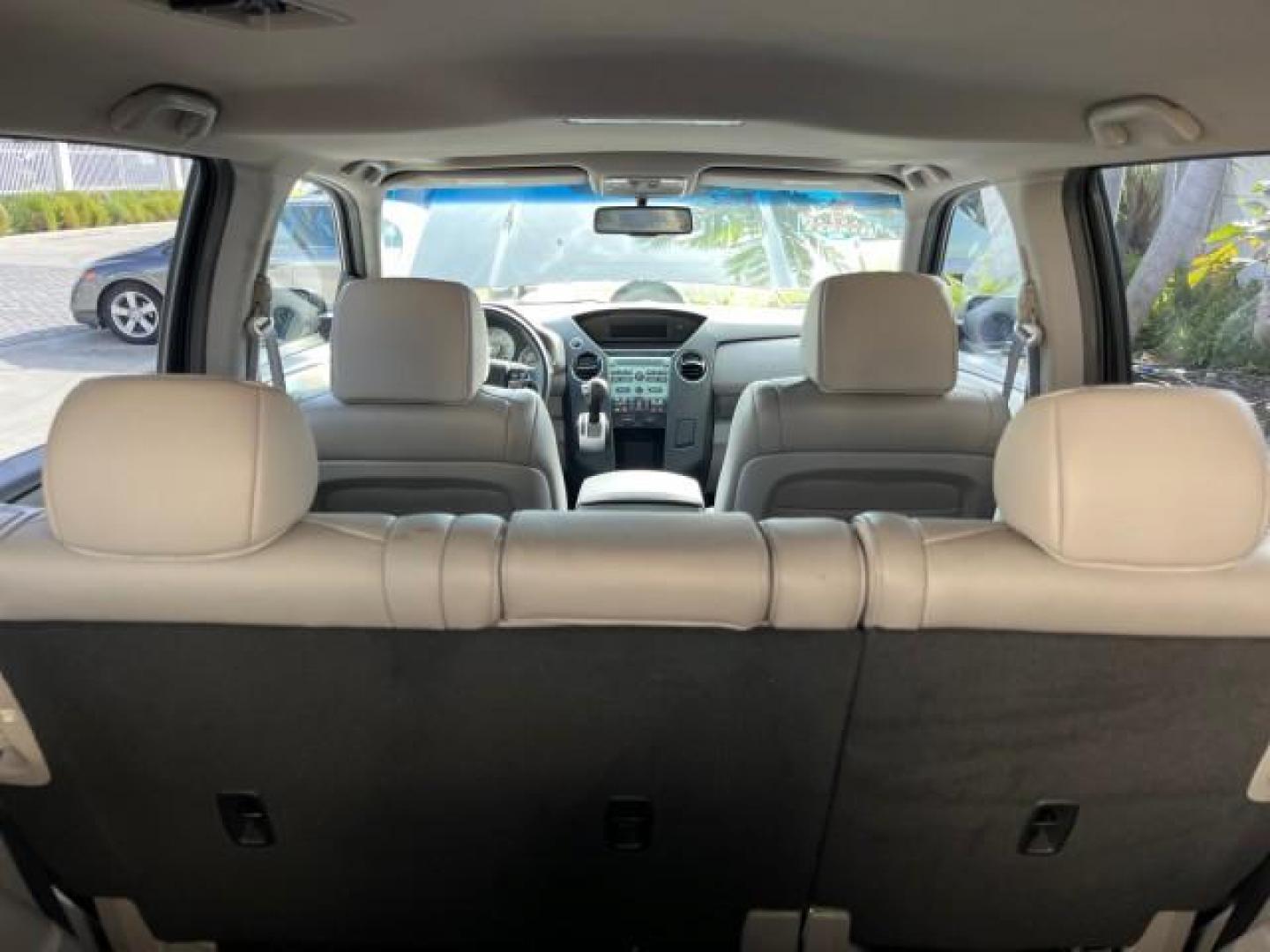 2011 Crystal Black Pearl /Gray Honda Pilot 1 FL EX-L LOW MILES 58,977 (5FNYF3H55BB) with an 3.5L SOHC MPFI 24-Valve i-VTEC V6 Engine engine, Automatic transmission, located at 4701 North Dixie Hwy, Pompano Beach, FL, 33064, (954) 422-2889, 26.240938, -80.123474 - OUR WEBPAGE FLORIDACARS1.COM HAS OVER 100 PHOTOS AND FREE CARFAX LINK 2011 HONDA PILOT EX-L ROAD READY 3.5L V6 VIN: 5FNYF3H55BB047158 NO ACCIDENTS NO RECALLS 4 DOOR WAGON/SPORT UTILITY 1 OWNER FLORIDA 3.5L V6 F SOHC 24V DUAL AC LOW MILES 58,977 GASOLINE 3 ROW SEATS POWER LEATHER SEATS FRONT WHEEL DR - Photo#85