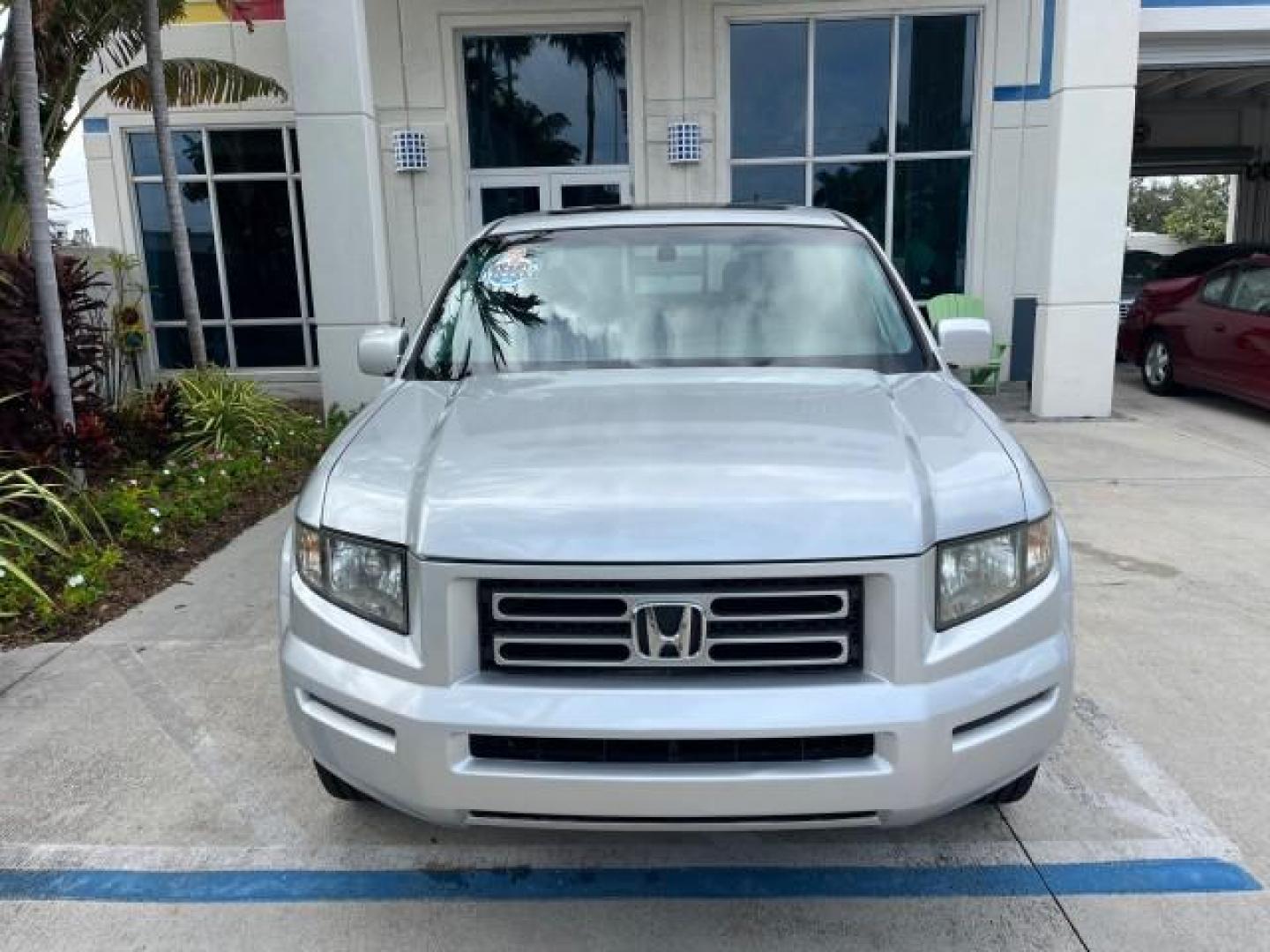 2007 Billet Silver Metallic /Gray Honda Ridgeline 1 OWNER RTL w/Leather LOW MILES 90,340 (2HJYK16587H) with an 3.5L SOHC PGM-FI 24-Valve VTEC V6 Engine engine, Automatic transmission, located at 4701 North Dixie Hwy, Pompano Beach, FL, 33064, (954) 422-2889, 26.240938, -80.123474 - OUR WEBPAGE FLORIDACARS1.COM HAS OVER 100 PHOTOS AND FREE CARFAX LINK 2007 HONDA RIDGELINE RTL ROAD READY 3.5L V6 VIN: 2HJYK16587H550716 NO ACCIDENTS SUNROOF CREW PICKUP NO RECALLS 4X4 3.5L V6 F SOHC 24V 1 OWNER FLORIDA GASOLINE AWD LOW MILES 90,340 FRONT WHEEL DRIVE W/ 4X4 5.0 FT BED POWER LEATHER - Photo#68