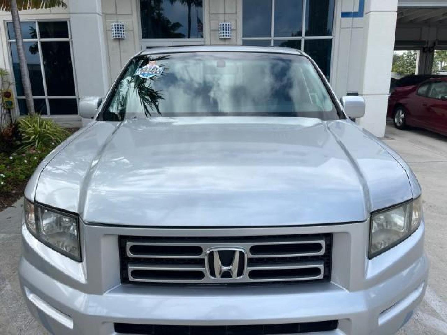 2007 Billet Silver Metallic /Gray Honda Ridgeline 1 OWNER RTL w/Leather LOW MILES 90,340 (2HJYK16587H) with an 3.5L SOHC PGM-FI 24-Valve VTEC V6 Engine engine, Automatic transmission, located at 4701 North Dixie Hwy, Pompano Beach, FL, 33064, (954) 422-2889, 26.240938, -80.123474 - OUR WEBPAGE FLORIDACARS1.COM HAS OVER 100 PHOTOS AND FREE CARFAX LINK 2007 HONDA RIDGELINE RTL ROAD READY 3.5L V6 VIN: 2HJYK16587H550716 NO ACCIDENTS SUNROOF CREW PICKUP NO RECALLS 4X4 3.5L V6 F SOHC 24V 1 OWNER FLORIDA GASOLINE AWD LOW MILES 90,340 FRONT WHEEL DRIVE W/ 4X4 5.0 FT BED POWER LEATHER - Photo#73