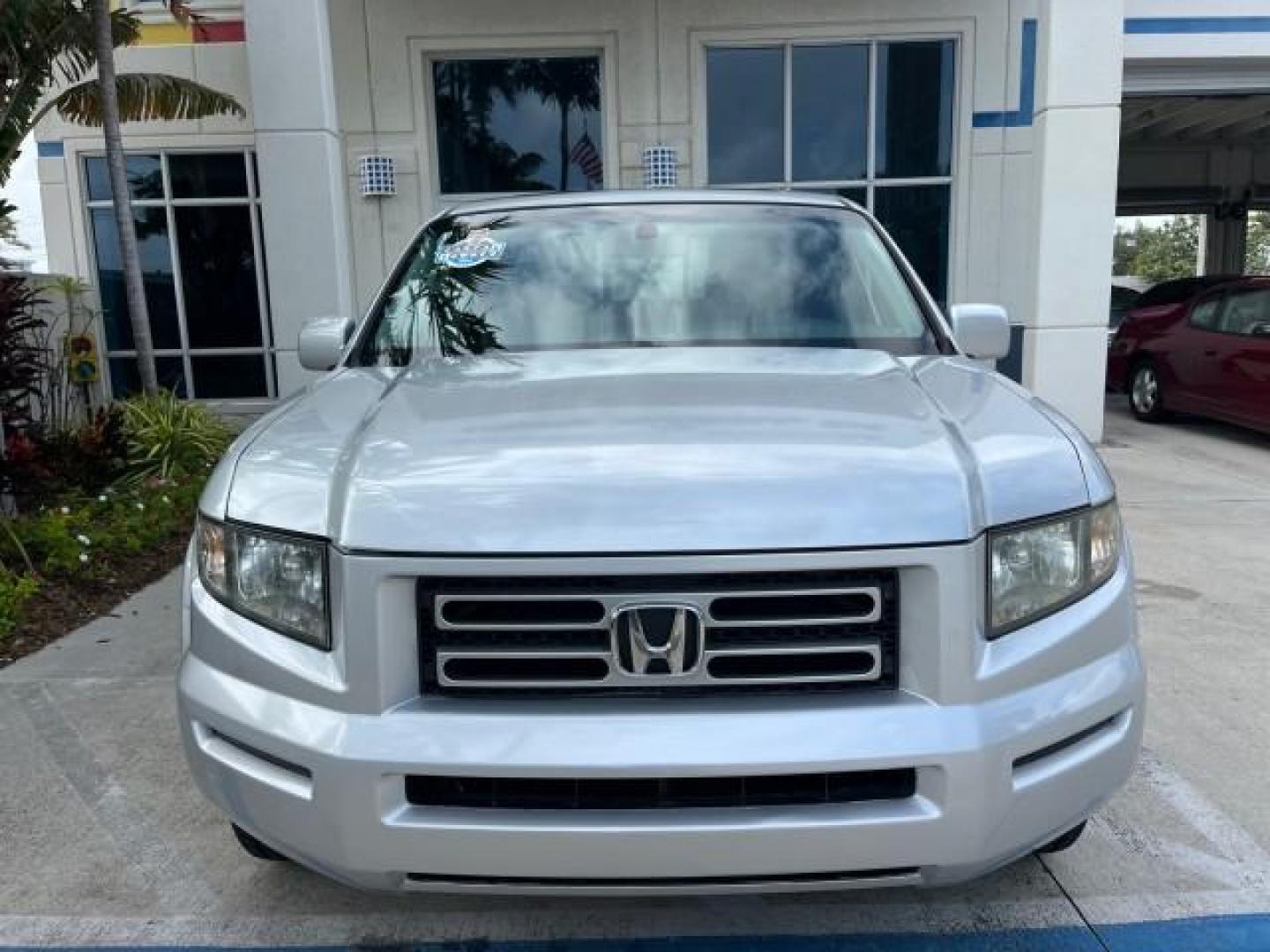 2007 Billet Silver Metallic /Gray Honda Ridgeline 1 OWNER RTL w/Leather LOW MILES 90,340 (2HJYK16587H) with an 3.5L SOHC PGM-FI 24-Valve VTEC V6 Engine engine, Automatic transmission, located at 4701 North Dixie Hwy, Pompano Beach, FL, 33064, (954) 422-2889, 26.240938, -80.123474 - OUR WEBPAGE FLORIDACARS1.COM HAS OVER 100 PHOTOS AND FREE CARFAX LINK 2007 HONDA RIDGELINE RTL ROAD READY 3.5L V6 VIN: 2HJYK16587H550716 NO ACCIDENTS SUNROOF CREW PICKUP NO RECALLS 4X4 3.5L V6 F SOHC 24V 1 OWNER FLORIDA GASOLINE AWD LOW MILES 90,340 FRONT WHEEL DRIVE W/ 4X4 5.0 FT BED POWER LEATHER - Photo#74