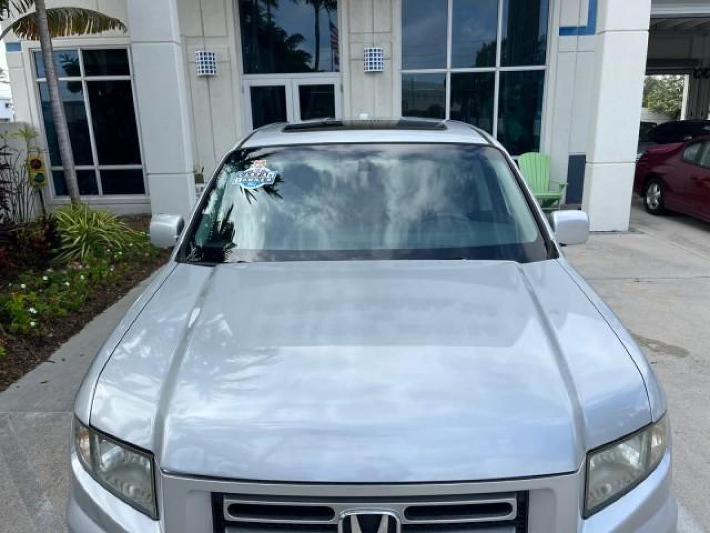 2007 Billet Silver Metallic /Gray Honda Ridgeline 1 OWNER RTL w/Leather LOW MILES 90,340 (2HJYK16587H) with an 3.5L SOHC PGM-FI 24-Valve VTEC V6 Engine engine, Automatic transmission, located at 4701 North Dixie Hwy, Pompano Beach, FL, 33064, (954) 422-2889, 26.240938, -80.123474 - OUR WEBPAGE FLORIDACARS1.COM HAS OVER 100 PHOTOS AND FREE CARFAX LINK 2007 HONDA RIDGELINE RTL ROAD READY 3.5L V6 VIN: 2HJYK16587H550716 NO ACCIDENTS SUNROOF CREW PICKUP NO RECALLS 4X4 3.5L V6 F SOHC 24V 1 OWNER FLORIDA GASOLINE AWD LOW MILES 90,340 FRONT WHEEL DRIVE W/ 4X4 5.0 FT BED POWER LEATHER - Photo#75