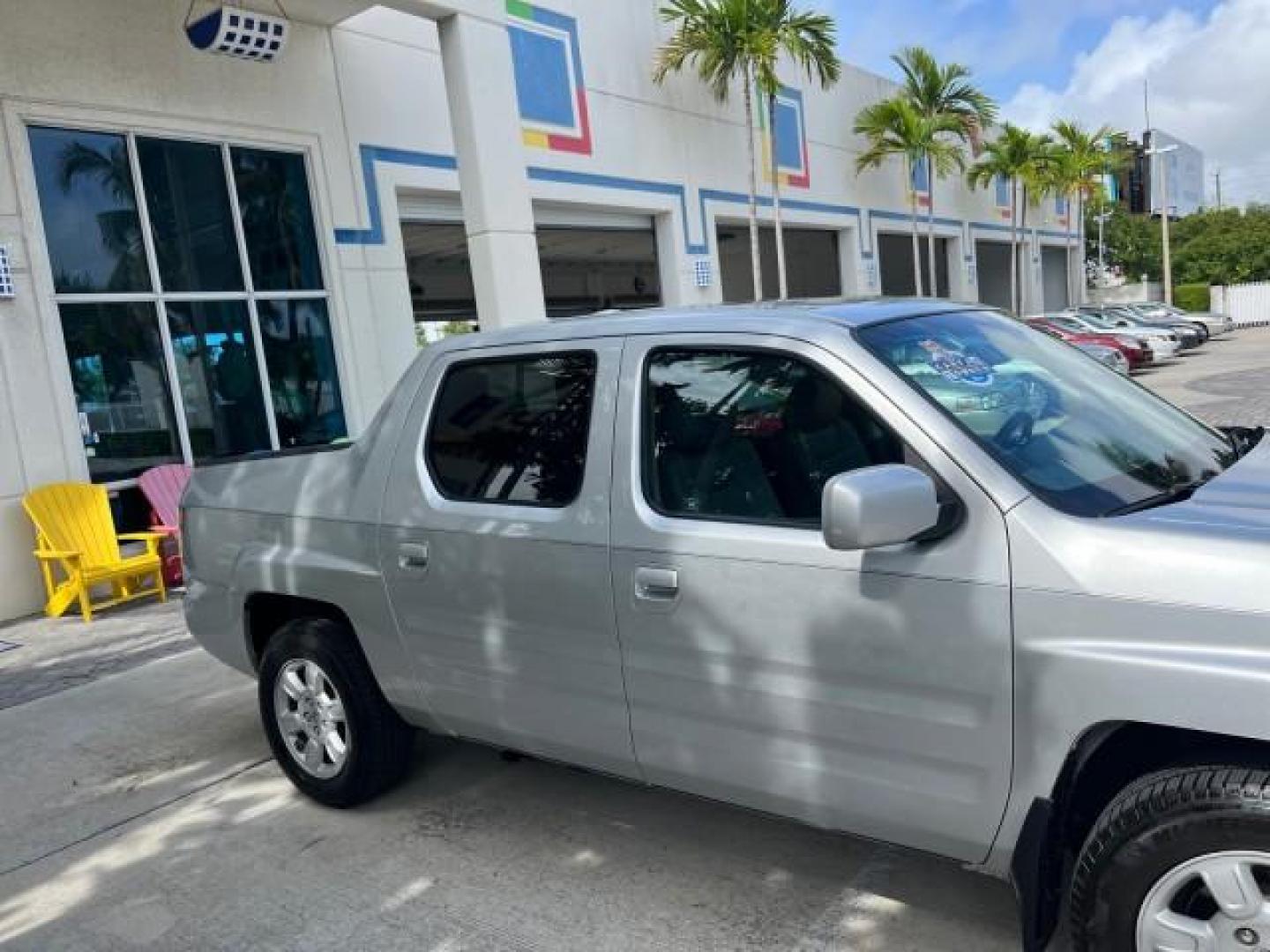 2007 Billet Silver Metallic /Gray Honda Ridgeline 1 OWNER RTL w/Leather LOW MILES 90,340 (2HJYK16587H) with an 3.5L SOHC PGM-FI 24-Valve VTEC V6 Engine engine, Automatic transmission, located at 4701 North Dixie Hwy, Pompano Beach, FL, 33064, (954) 422-2889, 26.240938, -80.123474 - OUR WEBPAGE FLORIDACARS1.COM HAS OVER 100 PHOTOS AND FREE CARFAX LINK 2007 HONDA RIDGELINE RTL ROAD READY 3.5L V6 VIN: 2HJYK16587H550716 NO ACCIDENTS SUNROOF CREW PICKUP NO RECALLS 4X4 3.5L V6 F SOHC 24V 1 OWNER FLORIDA GASOLINE AWD LOW MILES 90,340 FRONT WHEEL DRIVE W/ 4X4 5.0 FT BED POWER LEATHER - Photo#81