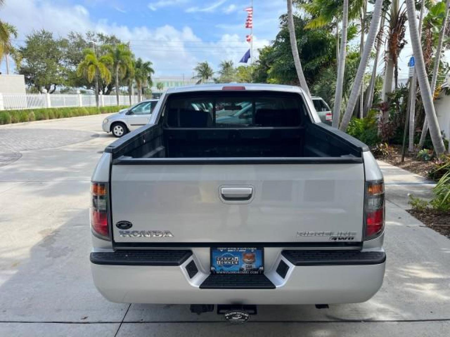 2007 Billet Silver Metallic /Gray Honda Ridgeline 1 OWNER RTL w/Leather LOW MILES 90,340 (2HJYK16587H) with an 3.5L SOHC PGM-FI 24-Valve VTEC V6 Engine engine, Automatic transmission, located at 4701 North Dixie Hwy, Pompano Beach, FL, 33064, (954) 422-2889, 26.240938, -80.123474 - OUR WEBPAGE FLORIDACARS1.COM HAS OVER 100 PHOTOS AND FREE CARFAX LINK 2007 HONDA RIDGELINE RTL ROAD READY 3.5L V6 VIN: 2HJYK16587H550716 NO ACCIDENTS SUNROOF CREW PICKUP NO RECALLS 4X4 3.5L V6 F SOHC 24V 1 OWNER FLORIDA GASOLINE AWD LOW MILES 90,340 FRONT WHEEL DRIVE W/ 4X4 5.0 FT BED POWER LEATHER - Photo#92