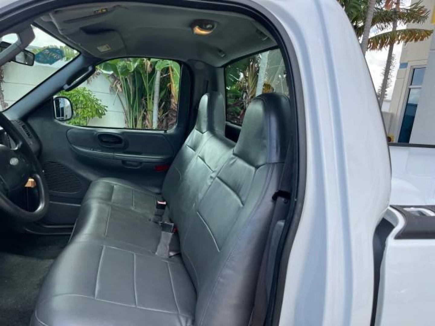 2003 Oxford White /Dark Graphite Ford F-150 1 FL XL LOW MILES 27,907 (2FTRF17L33C) with an 5.4L 8-Cyl Engine engine, Automatic transmission, located at 4701 North Dixie Hwy, Pompano Beach, FL, 33064, (954) 422-2889, 26.240938, -80.123474 - OUR WEBPAGE FLORIDACARS1.COM HAS OVER 100 PHOTOS AND FREE CARFAX LINK 2003 FORD F-150 XL LONG BED ROAD READY WORK READY VIN: 2FTRF17L33CA75039 NO ACCIDENTS 5.4L V8 PICKUP NO RECALLS 8.1FT BED 5.4L V8 F SOHC 16V 1 OWNER FLORIDA GASOLINE SUPER LOW MILES 27,907 REAR WHEEL DRIVE 18 SERVICE RECORDS Appro - Photo#35