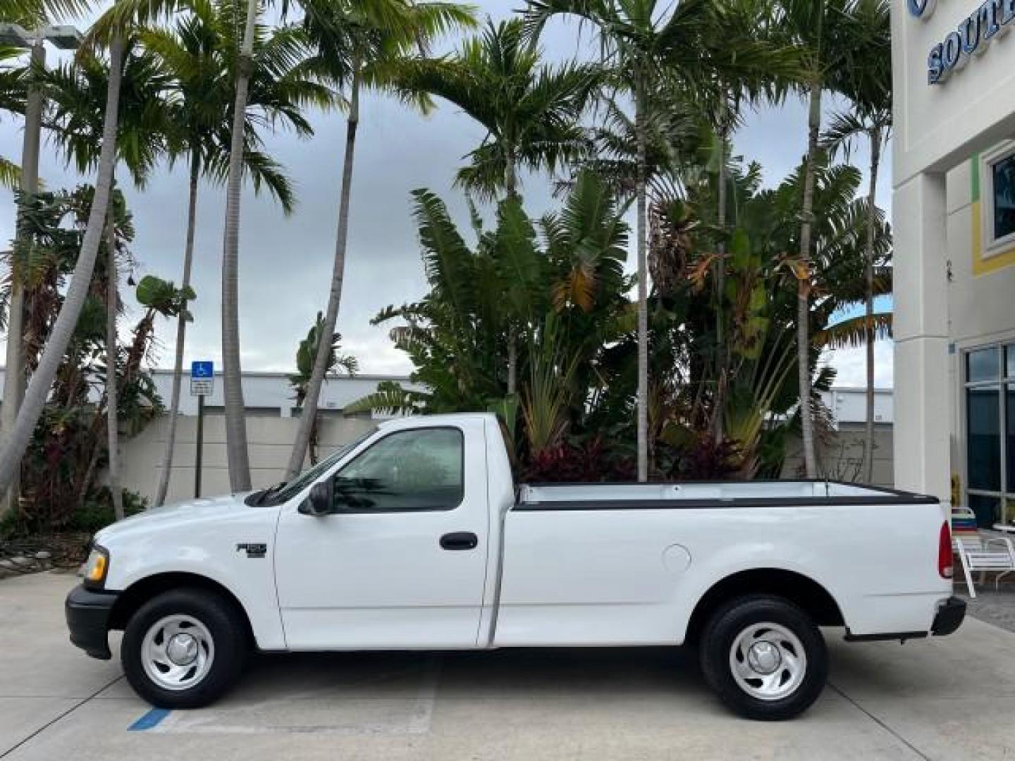 2003 Oxford White /Dark Graphite Ford F-150 1 FL XL LOW MILES 27,907 (2FTRF17L33C) with an 5.4L 8-Cyl Engine engine, Automatic transmission, located at 4701 North Dixie Hwy, Pompano Beach, FL, 33064, (954) 422-2889, 26.240938, -80.123474 - OUR WEBPAGE FLORIDACARS1.COM HAS OVER 100 PHOTOS AND FREE CARFAX LINK 2003 FORD F-150 XL LONG BED ROAD READY WORK READY VIN: 2FTRF17L33CA75039 NO ACCIDENTS 5.4L V8 PICKUP NO RECALLS 8.1FT BED 5.4L V8 F SOHC 16V 1 OWNER FLORIDA GASOLINE SUPER LOW MILES 27,907 REAR WHEEL DRIVE 18 SERVICE RECORDS Appro - Photo#4