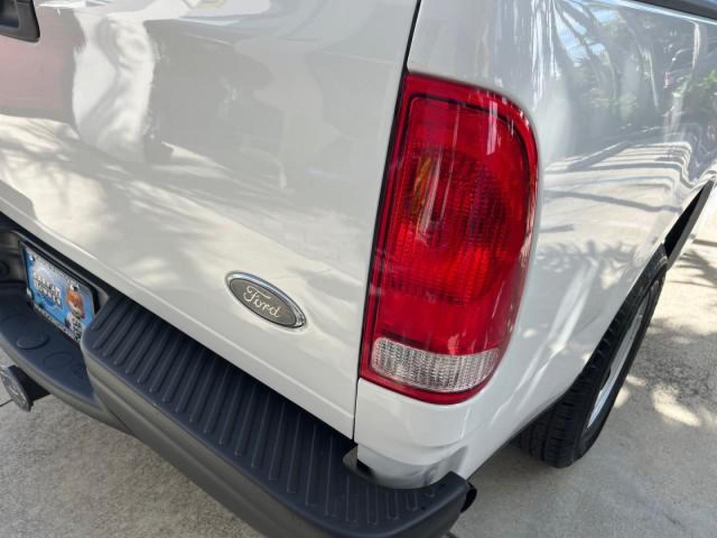 2003 Oxford White /Dark Graphite Ford F-150 1 FL XL LOW MILES 27,907 (2FTRF17L33C) with an 5.4L 8-Cyl Engine engine, Automatic transmission, located at 4701 North Dixie Hwy, Pompano Beach, FL, 33064, (954) 422-2889, 26.240938, -80.123474 - OUR WEBPAGE FLORIDACARS1.COM HAS OVER 100 PHOTOS AND FREE CARFAX LINK 2003 FORD F-150 XL LONG BED ROAD READY WORK READY VIN: 2FTRF17L33CA75039 NO ACCIDENTS 5.4L V8 PICKUP NO RECALLS 8.1FT BED 5.4L V8 F SOHC 16V 1 OWNER FLORIDA GASOLINE SUPER LOW MILES 27,907 REAR WHEEL DRIVE 18 SERVICE RECORDS Appro - Photo#87