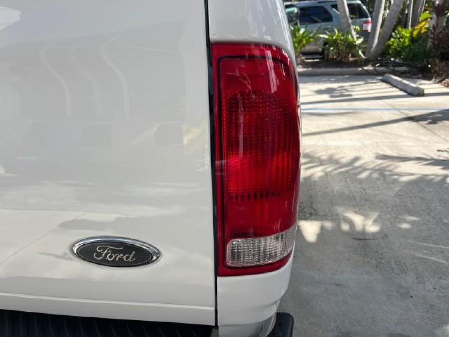 2003 Oxford White /Dark Graphite Ford F-150 1 FL XL LOW MILES 27,907 (2FTRF17L33C) with an 5.4L 8-Cyl Engine engine, Automatic transmission, located at 4701 North Dixie Hwy, Pompano Beach, FL, 33064, (954) 422-2889, 26.240938, -80.123474 - OUR WEBPAGE FLORIDACARS1.COM HAS OVER 100 PHOTOS AND FREE CARFAX LINK 2003 FORD F-150 XL LONG BED ROAD READY WORK READY VIN: 2FTRF17L33CA75039 NO ACCIDENTS 5.4L V8 PICKUP NO RECALLS 8.1FT BED 5.4L V8 F SOHC 16V 1 OWNER FLORIDA GASOLINE SUPER LOW MILES 27,907 REAR WHEEL DRIVE 18 SERVICE RECORDS Appro - Photo#88