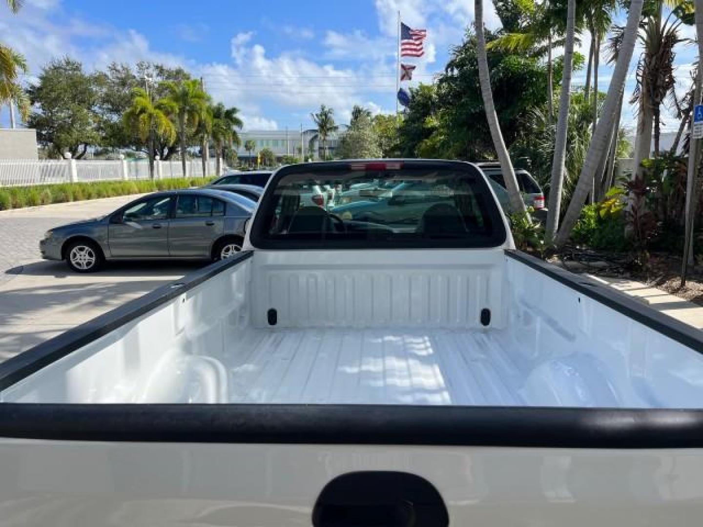 2003 Oxford White /Dark Graphite Ford F-150 1 FL XL LOW MILES 27,907 (2FTRF17L33C) with an 5.4L 8-Cyl Engine engine, Automatic transmission, located at 4701 North Dixie Hwy, Pompano Beach, FL, 33064, (954) 422-2889, 26.240938, -80.123474 - OUR WEBPAGE FLORIDACARS1.COM HAS OVER 100 PHOTOS AND FREE CARFAX LINK 2003 FORD F-150 XL LONG BED ROAD READY WORK READY VIN: 2FTRF17L33CA75039 NO ACCIDENTS 5.4L V8 PICKUP NO RECALLS 8.1FT BED 5.4L V8 F SOHC 16V 1 OWNER FLORIDA GASOLINE SUPER LOW MILES 27,907 REAR WHEEL DRIVE 18 SERVICE RECORDS Appro - Photo#96