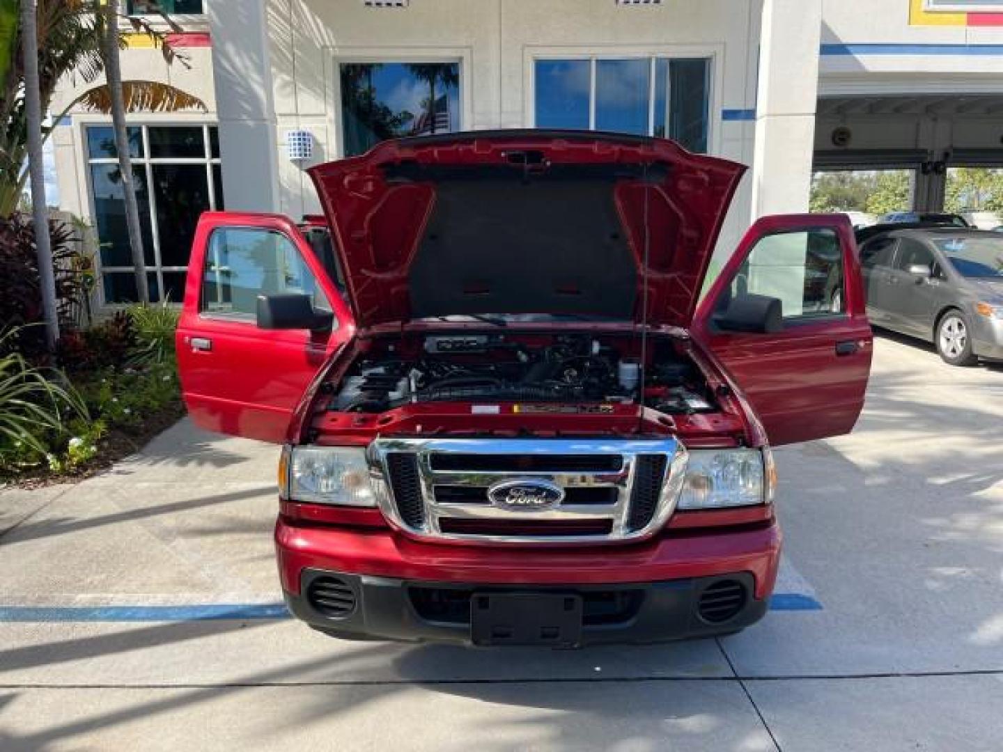 2008 Redfire Metallic /Medium Dk Flint Ford Ranger XLT SUPER CAB LOW MILES 44,681 (1FTYR44U78P) with an 3.0L OHV V6 Engine engine, Automatic transmission, located at 4701 North Dixie Hwy, Pompano Beach, FL, 33064, (954) 422-2889, 26.240938, -80.123474 - OUR WEBPAGE FLORIDACARS1.COM HAS OVER 100 PHOTOS AND FREE CARFAX LINK 2008 FORD RANGER SPORT ROAD READY WORK READY VIN: 1FTYR44U78PB16831 LOW MILES 44,681 4 DOOR EXTENDED CAB PICKUP NO ACCIDENTS 3.0L V6 3.0L V6 F NO RECALLS 6,1 FT BED GASOLINE 16 SERVICE RECORDS REAR WHEEL DRIVE POWER MIRRORS XLT 4X - Photo#16