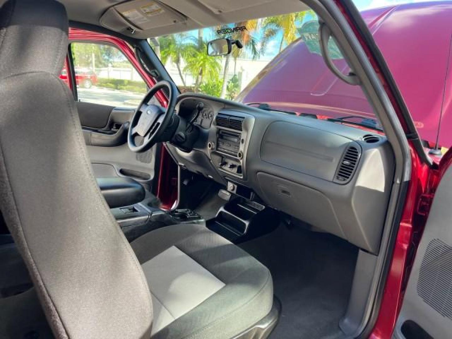 2008 Redfire Metallic /Medium Dk Flint Ford Ranger XLT SUPER CAB LOW MILES 44,681 (1FTYR44U78P) with an 3.0L OHV V6 Engine engine, Automatic transmission, located at 4701 North Dixie Hwy, Pompano Beach, FL, 33064, (954) 422-2889, 26.240938, -80.123474 - OUR WEBPAGE FLORIDACARS1.COM HAS OVER 100 PHOTOS AND FREE CARFAX LINK 2008 FORD RANGER SPORT ROAD READY WORK READY VIN: 1FTYR44U78PB16831 LOW MILES 44,681 4 DOOR EXTENDED CAB PICKUP NO ACCIDENTS 3.0L V6 3.0L V6 F NO RECALLS 6,1 FT BED GASOLINE 16 SERVICE RECORDS REAR WHEEL DRIVE POWER MIRRORS XLT 4X - Photo#30