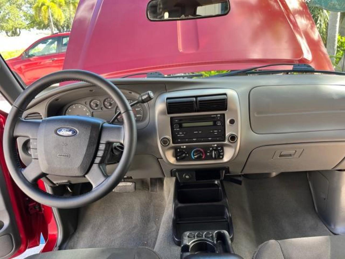 2008 Redfire Metallic /Medium Dk Flint Ford Ranger XLT SUPER CAB LOW MILES 44,681 (1FTYR44U78P) with an 3.0L OHV V6 Engine engine, Automatic transmission, located at 4701 North Dixie Hwy, Pompano Beach, FL, 33064, (954) 422-2889, 26.240938, -80.123474 - OUR WEBPAGE FLORIDACARS1.COM HAS OVER 100 PHOTOS AND FREE CARFAX LINK 2008 FORD RANGER SPORT ROAD READY WORK READY VIN: 1FTYR44U78PB16831 LOW MILES 44,681 4 DOOR EXTENDED CAB PICKUP NO ACCIDENTS 3.0L V6 3.0L V6 F NO RECALLS 6,1 FT BED GASOLINE 16 SERVICE RECORDS REAR WHEEL DRIVE POWER MIRRORS XLT 4X - Photo#35