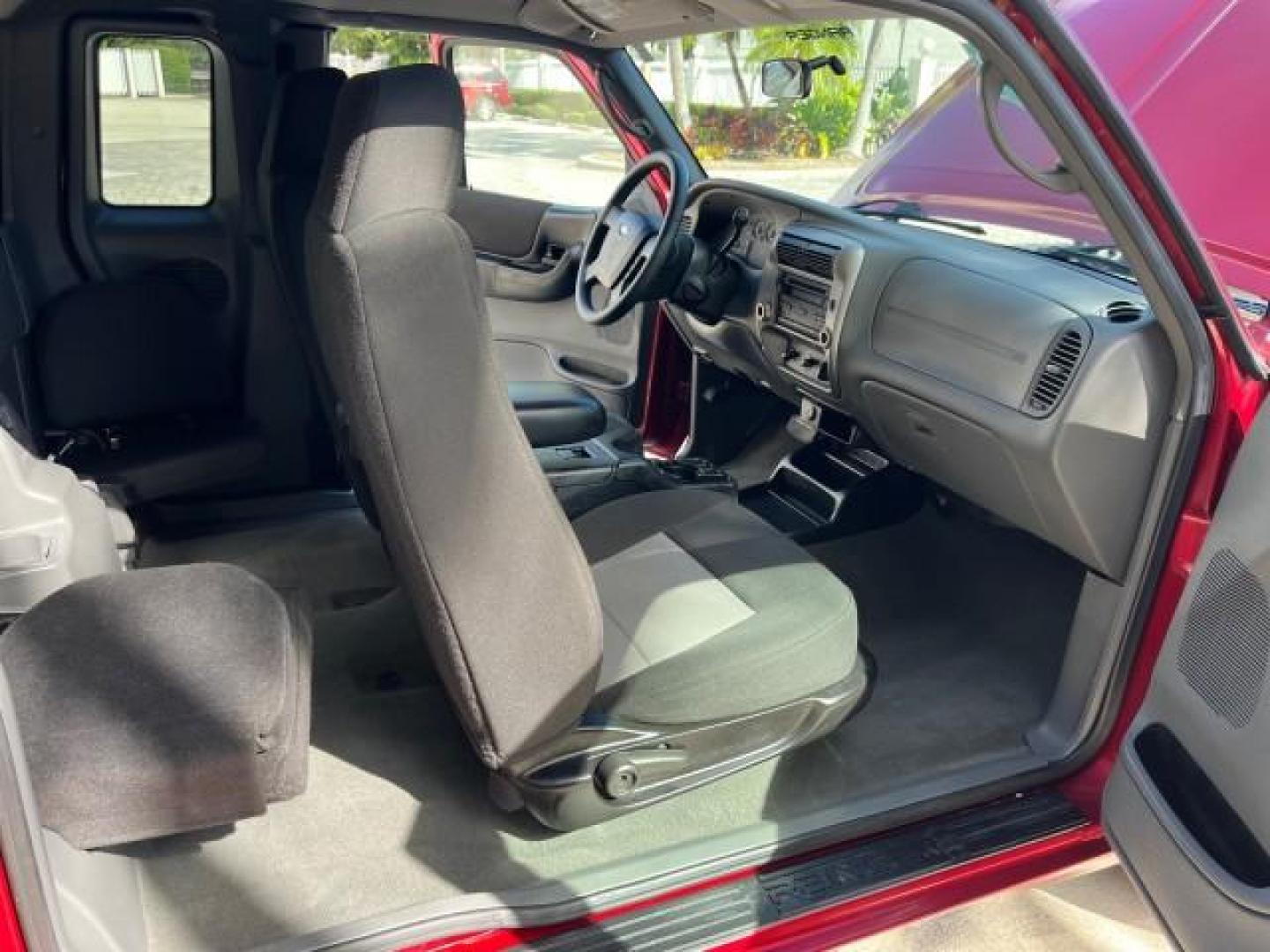 2008 Redfire Metallic /Medium Dk Flint Ford Ranger XLT SUPER CAB LOW MILES 44,681 (1FTYR44U78P) with an 3.0L OHV V6 Engine engine, Automatic transmission, located at 4701 North Dixie Hwy, Pompano Beach, FL, 33064, (954) 422-2889, 26.240938, -80.123474 - OUR WEBPAGE FLORIDACARS1.COM HAS OVER 100 PHOTOS AND FREE CARFAX LINK 2008 FORD RANGER SPORT ROAD READY WORK READY VIN: 1FTYR44U78PB16831 LOW MILES 44,681 4 DOOR EXTENDED CAB PICKUP NO ACCIDENTS 3.0L V6 3.0L V6 F NO RECALLS 6,1 FT BED GASOLINE 16 SERVICE RECORDS REAR WHEEL DRIVE POWER MIRRORS XLT 4X - Photo#39