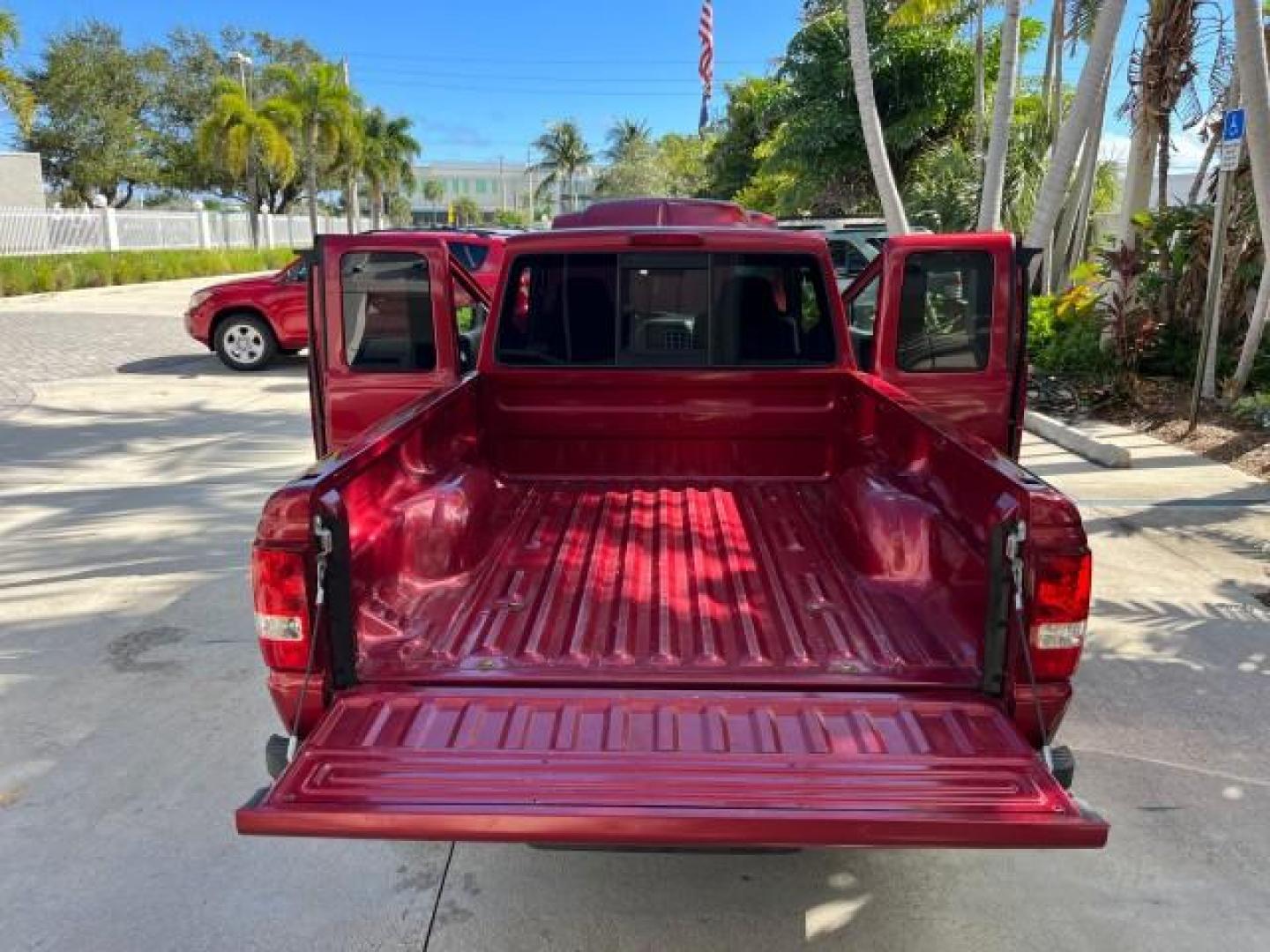 2008 Redfire Metallic /Medium Dk Flint Ford Ranger XLT SUPER CAB LOW MILES 44,681 (1FTYR44U78P) with an 3.0L OHV V6 Engine engine, Automatic transmission, located at 4701 North Dixie Hwy, Pompano Beach, FL, 33064, (954) 422-2889, 26.240938, -80.123474 - OUR WEBPAGE FLORIDACARS1.COM HAS OVER 100 PHOTOS AND FREE CARFAX LINK 2008 FORD RANGER SPORT ROAD READY WORK READY VIN: 1FTYR44U78PB16831 LOW MILES 44,681 4 DOOR EXTENDED CAB PICKUP NO ACCIDENTS 3.0L V6 3.0L V6 F NO RECALLS 6,1 FT BED GASOLINE 16 SERVICE RECORDS REAR WHEEL DRIVE POWER MIRRORS XLT 4X - Photo#64