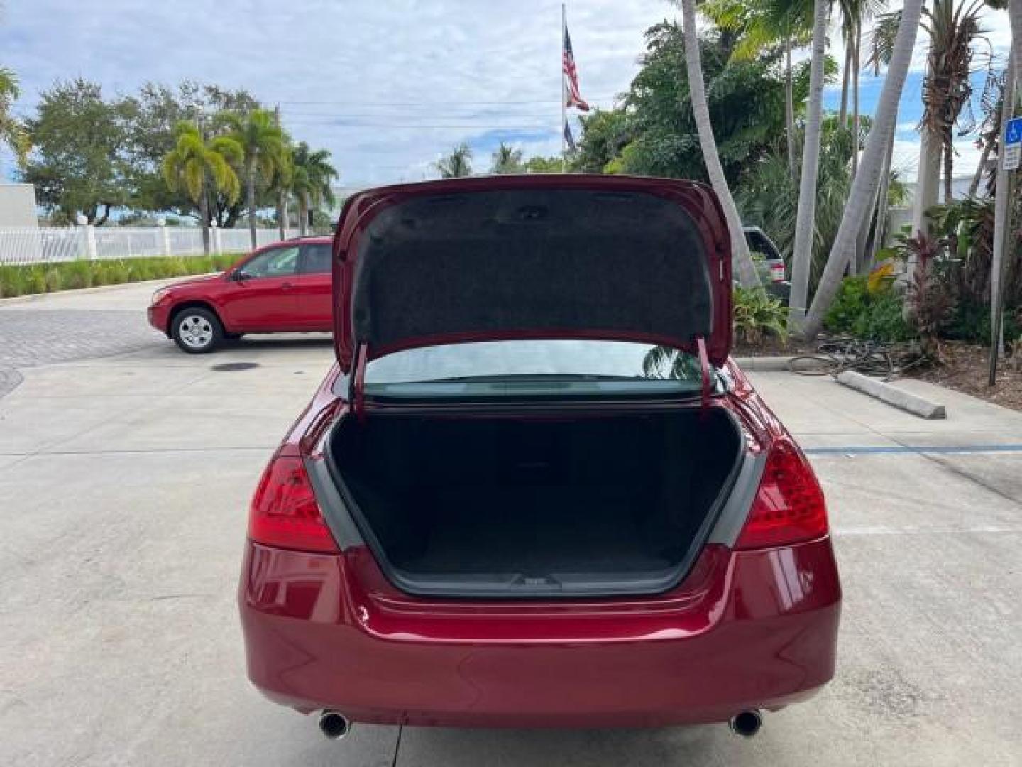 2007 Moroccan Red Pearl /Gray Honda Accord Sdn 1 FL EX-L LOW MILES 41,534 (1HGCM66827A) with an 3.0L SOHC MPFI 24-Valve VTEC V6 Engine engine, Automatic transmission, located at 4701 North Dixie Hwy, Pompano Beach, FL, 33064, (954) 422-2889, 26.240938, -80.123474 - OUR WEBPAGE FLORIDACARS1.COM HAS OVER 100 PHOTOS AND FREE CARFAX LINK 2007 HONDA ACCORD EX-L V-6 W/NAVI ROAD READY 3.0L V6 VIN: 1HGCM66827A042452 NO ACCIDENTS 29 MPG SEDAN 4 DR NO RECALLS SUNROOF 3.0L V6 F SOHC 24V 1 OWNER FLORIDA GASOLINE LOW MILES 41,534 FRONT WHEEL DRIVE NAVIGATION LEATHER SEATS - Photo#66