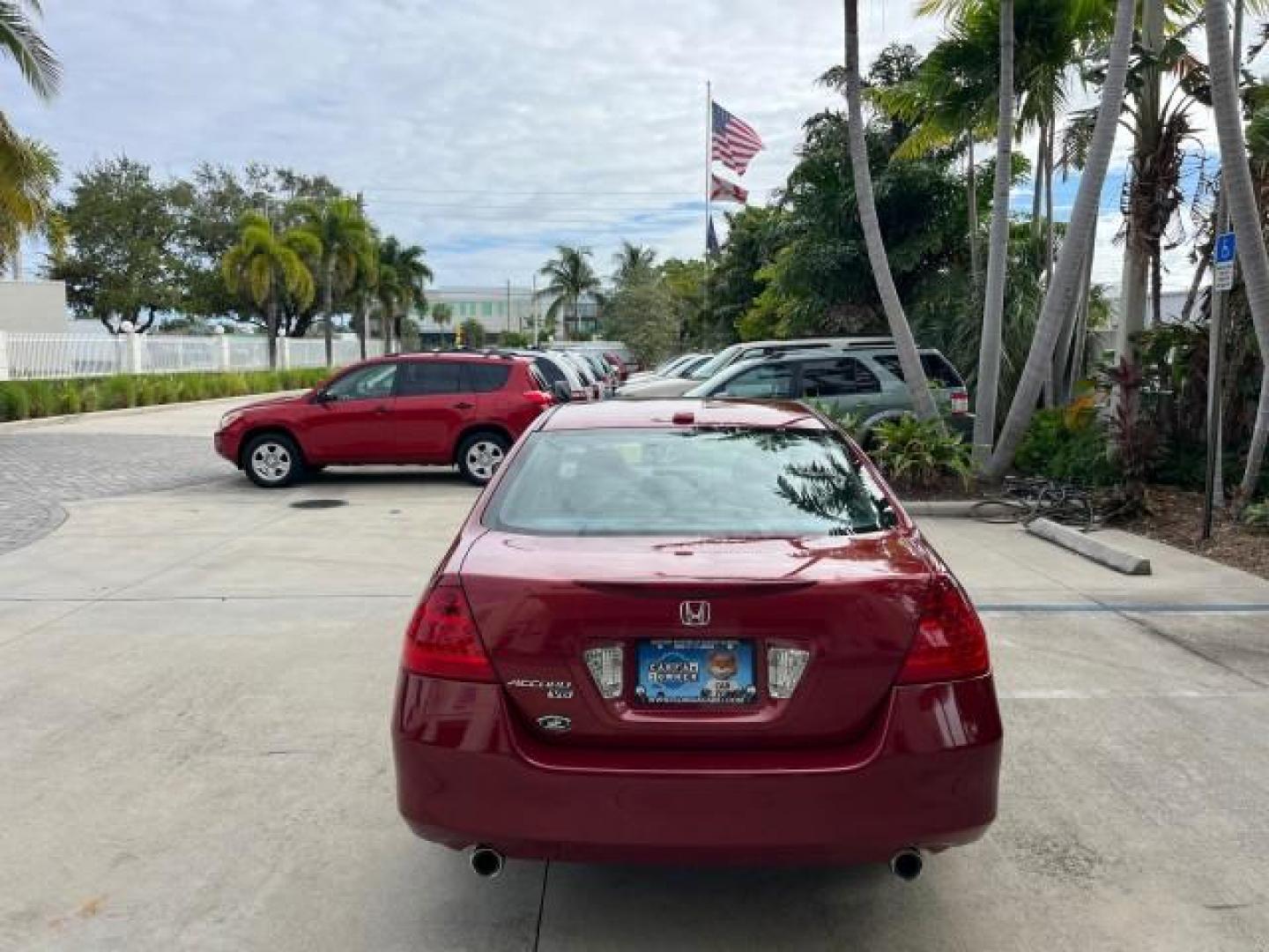 2007 Moroccan Red Pearl /Gray Honda Accord Sdn 1 FL EX-L LOW MILES 41,534 (1HGCM66827A) with an 3.0L SOHC MPFI 24-Valve VTEC V6 Engine engine, Automatic transmission, located at 4701 North Dixie Hwy, Pompano Beach, FL, 33064, (954) 422-2889, 26.240938, -80.123474 - OUR WEBPAGE FLORIDACARS1.COM HAS OVER 100 PHOTOS AND FREE CARFAX LINK 2007 HONDA ACCORD EX-L V-6 W/NAVI ROAD READY 3.0L V6 VIN: 1HGCM66827A042452 NO ACCIDENTS 29 MPG SEDAN 4 DR NO RECALLS SUNROOF 3.0L V6 F SOHC 24V 1 OWNER FLORIDA GASOLINE LOW MILES 41,534 FRONT WHEEL DRIVE NAVIGATION LEATHER SEATS - Photo#6