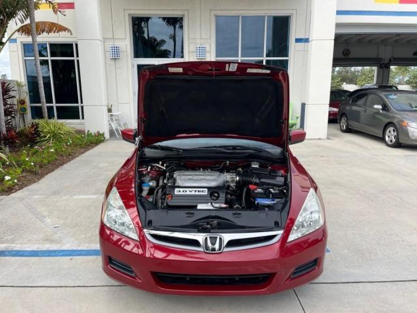 2007 Moroccan Red Pearl /Gray Honda Accord Sdn 1 FL EX-L LOW MILES 41,534 (1HGCM66827A) with an 3.0L SOHC MPFI 24-Valve VTEC V6 Engine engine, Automatic transmission, located at 4701 North Dixie Hwy, Pompano Beach, FL, 33064, (954) 422-2889, 26.240938, -80.123474 - OUR WEBPAGE FLORIDACARS1.COM HAS OVER 100 PHOTOS AND FREE CARFAX LINK 2007 HONDA ACCORD EX-L V-6 W/NAVI ROAD READY 3.0L V6 VIN: 1HGCM66827A042452 NO ACCIDENTS 29 MPG SEDAN 4 DR NO RECALLS SUNROOF 3.0L V6 F SOHC 24V 1 OWNER FLORIDA GASOLINE LOW MILES 41,534 FRONT WHEEL DRIVE NAVIGATION LEATHER SEATS - Photo#71