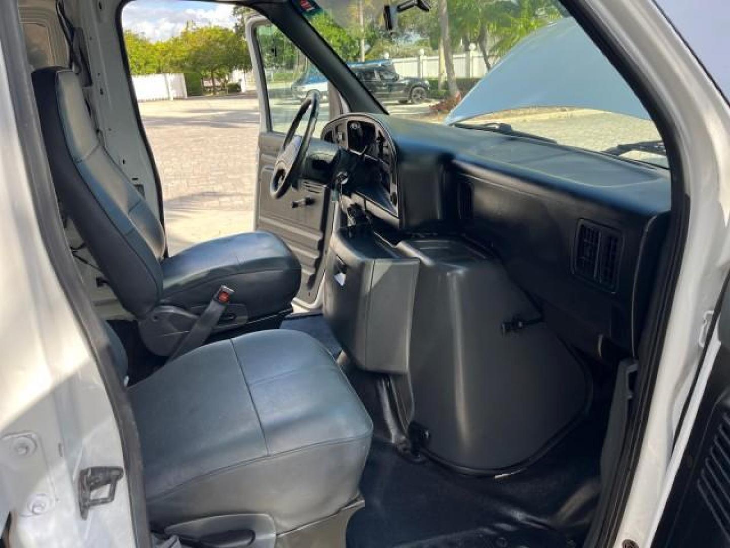 1994 WHITE /GREY Ford Econoline Cargo Van 350 EXT 1 FL LOW MILES 32,200 (1FTJS34H1RH) with an 5.8L EFI V8 Engine engine, Automatic transmission, located at 4701 North Dixie Hwy, Pompano Beach, FL, 33064, (954) 422-2889, 26.240938, -80.123474 - OUR WEBPAGE FLORIDACARS1.COM HAS OVER 100 PHOTOS AND FREE CARFAX LINK 1994 FORD E-350 SUPER EXT ROAD READY WORK READY VIN: 1FTJS34H1RHB36720 NO RECALLS 5.8L V8 VAN SUPER LOW MILES 32,200 5.8L V8 F 1 OWNER FLORIDA GASOLINE 5 SERVICE RECORDS REAR WHEEL DRIVE THIS IS ONE OF THE NICEST FORD S WE HAVE EV - Photo#12