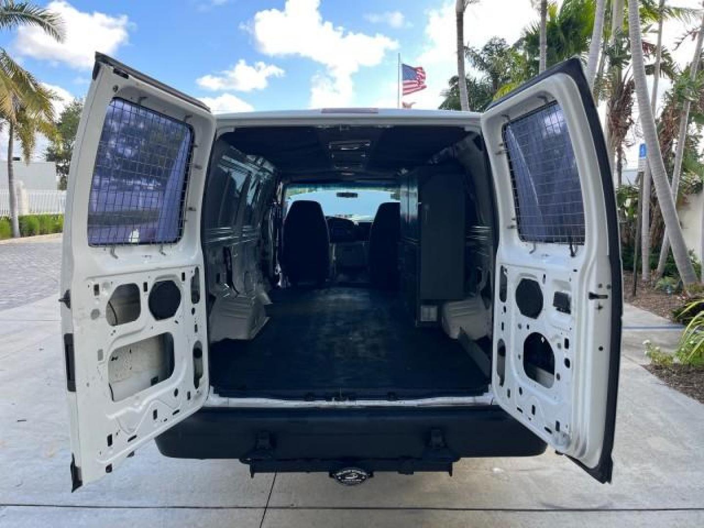 1994 WHITE /GREY Ford Econoline Cargo Van 350 EXT 1 FL LOW MILES 32,200 (1FTJS34H1RH) with an 5.8L EFI V8 Engine engine, Automatic transmission, located at 4701 North Dixie Hwy, Pompano Beach, FL, 33064, (954) 422-2889, 26.240938, -80.123474 - OUR WEBPAGE FLORIDACARS1.COM HAS OVER 100 PHOTOS AND FREE CARFAX LINK 1994 FORD E-350 SUPER EXT ROAD READY WORK READY VIN: 1FTJS34H1RHB36720 NO RECALLS 5.8L V8 VAN SUPER LOW MILES 32,200 5.8L V8 F 1 OWNER FLORIDA GASOLINE 5 SERVICE RECORDS REAR WHEEL DRIVE THIS IS ONE OF THE NICEST FORD S WE HAVE EV - Photo#34