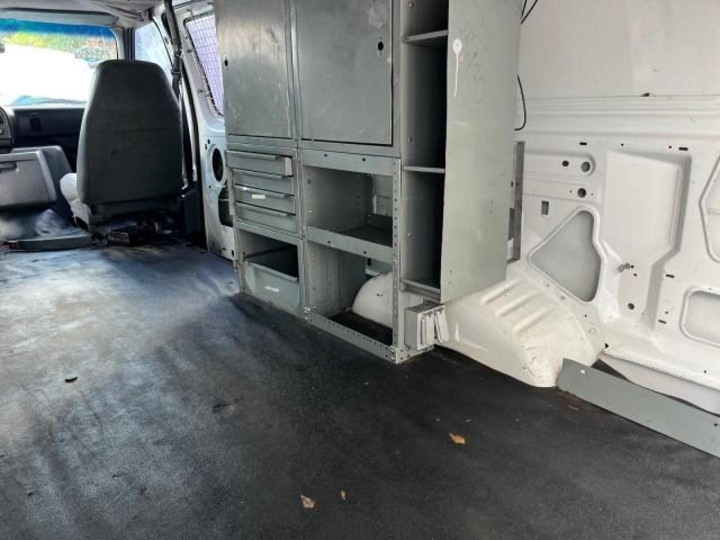 1994 WHITE /GREY Ford Econoline Cargo Van 350 EXT 1 FL LOW MILES 32,200 (1FTJS34H1RH) with an 5.8L EFI V8 Engine engine, Automatic transmission, located at 4701 North Dixie Hwy, Pompano Beach, FL, 33064, (954) 422-2889, 26.240938, -80.123474 - OUR WEBPAGE FLORIDACARS1.COM HAS OVER 100 PHOTOS AND FREE CARFAX LINK 1994 FORD E-350 SUPER EXT ROAD READY WORK READY VIN: 1FTJS34H1RHB36720 NO RECALLS 5.8L V8 VAN SUPER LOW MILES 32,200 5.8L V8 F 1 OWNER FLORIDA GASOLINE 5 SERVICE RECORDS REAR WHEEL DRIVE THIS IS ONE OF THE NICEST FORD S WE HAVE EV - Photo#37