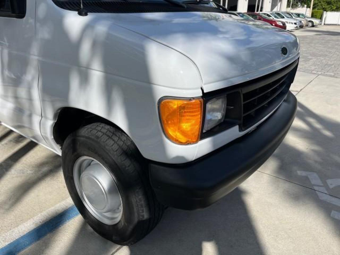 1994 WHITE /GREY Ford Econoline Cargo Van 350 EXT 1 FL LOW MILES 32,200 (1FTJS34H1RH) with an 5.8L EFI V8 Engine engine, Automatic transmission, located at 4701 North Dixie Hwy, Pompano Beach, FL, 33064, (954) 422-2889, 26.240938, -80.123474 - OUR WEBPAGE FLORIDACARS1.COM HAS OVER 100 PHOTOS AND FREE CARFAX LINK 1994 FORD E-350 SUPER EXT ROAD READY WORK READY VIN: 1FTJS34H1RHB36720 NO RECALLS 5.8L V8 VAN SUPER LOW MILES 32,200 5.8L V8 F 1 OWNER FLORIDA GASOLINE 5 SERVICE RECORDS REAR WHEEL DRIVE THIS IS ONE OF THE NICEST FORD S WE HAVE EV - Photo#74