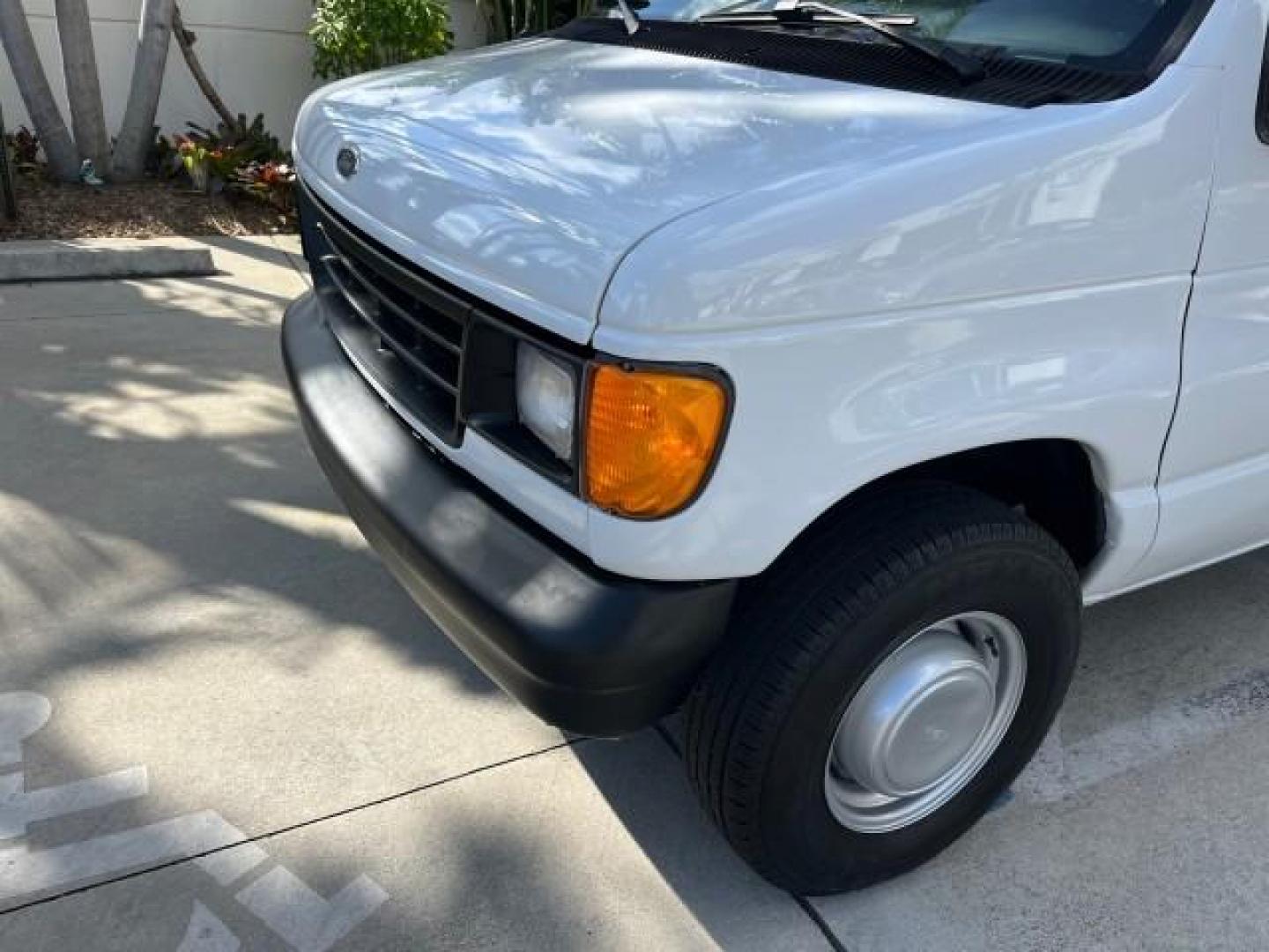 1994 WHITE /GREY Ford Econoline Cargo Van 350 EXT 1 FL LOW MILES 32,200 (1FTJS34H1RH) with an 5.8L EFI V8 Engine engine, Automatic transmission, located at 4701 North Dixie Hwy, Pompano Beach, FL, 33064, (954) 422-2889, 26.240938, -80.123474 - OUR WEBPAGE FLORIDACARS1.COM HAS OVER 100 PHOTOS AND FREE CARFAX LINK 1994 FORD E-350 SUPER EXT ROAD READY WORK READY VIN: 1FTJS34H1RHB36720 NO RECALLS 5.8L V8 VAN SUPER LOW MILES 32,200 5.8L V8 F 1 OWNER FLORIDA GASOLINE 5 SERVICE RECORDS REAR WHEEL DRIVE THIS IS ONE OF THE NICEST FORD S WE HAVE EV - Photo#75