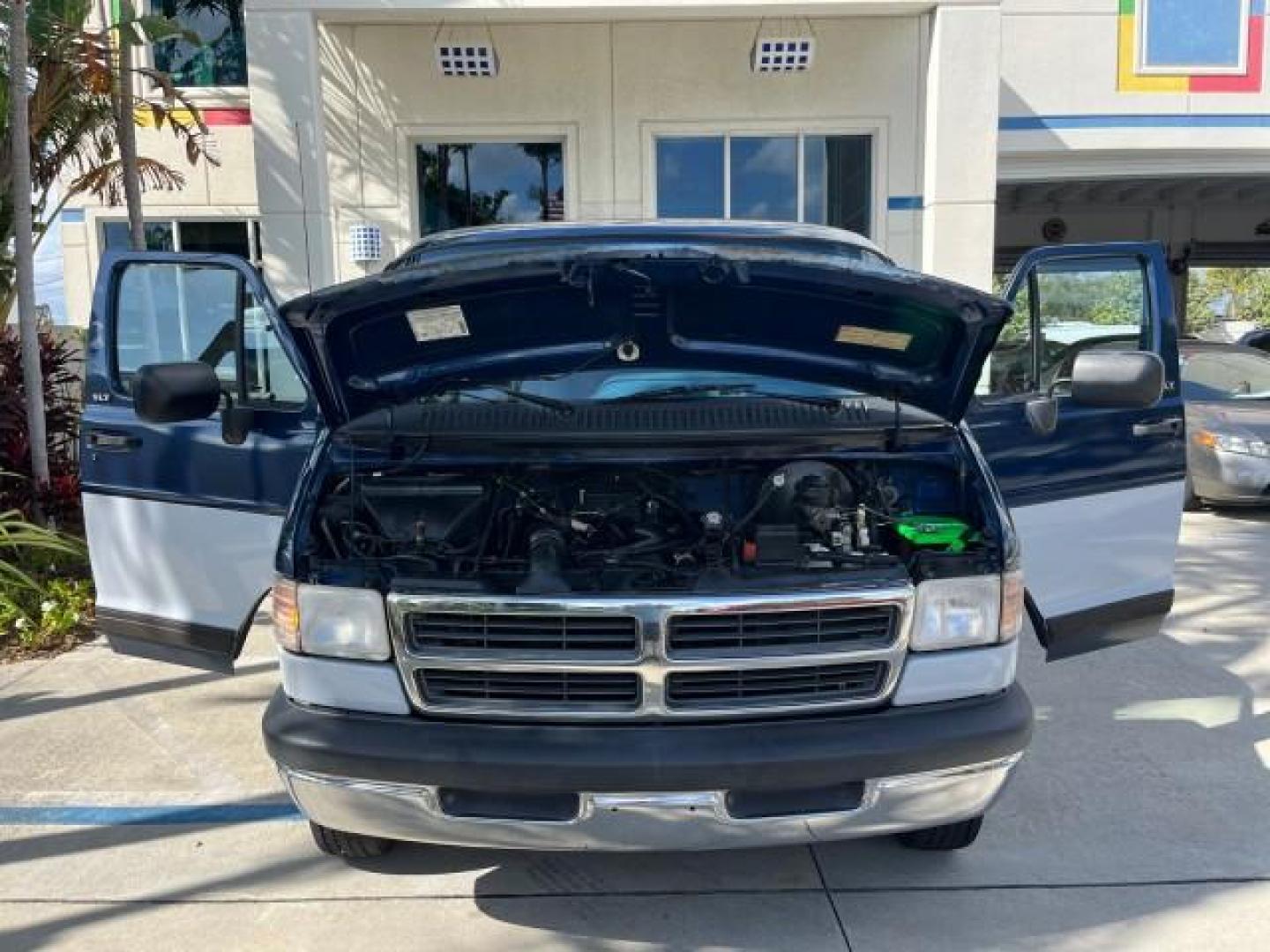 1995 BLUE /BLUE Dodge Ram Wagon EXT 15 PAS LOW MILES 69,523 (2B5WB35Z6SK) with an 5.9L MPI V8 Magnum Engine engine, Automatic transmission, located at 4701 North Dixie Hwy, Pompano Beach, FL, 33064, (954) 422-2889, 26.240938, -80.123474 - OUR WEBPAGE FLORIDACARS1.COM HAS OVER 100 PHOTOS AND FREE CARFAX LINK 1995 DODGE RAM VAN 3500 ROAD READY 5.9L V8 VIN: 2B5WB35Z6SK538547 NO ACCIDENTS VAN 15 PASSANGER 5.9L V8 F OHV 16V 4 ROW SEATS GASOLINE LOW MILES 69,523 REAR WHEEL DRIVE DUAL AC POWER MIRRORS Cloth Seats Running Boards Rear Air Con - Photo#17