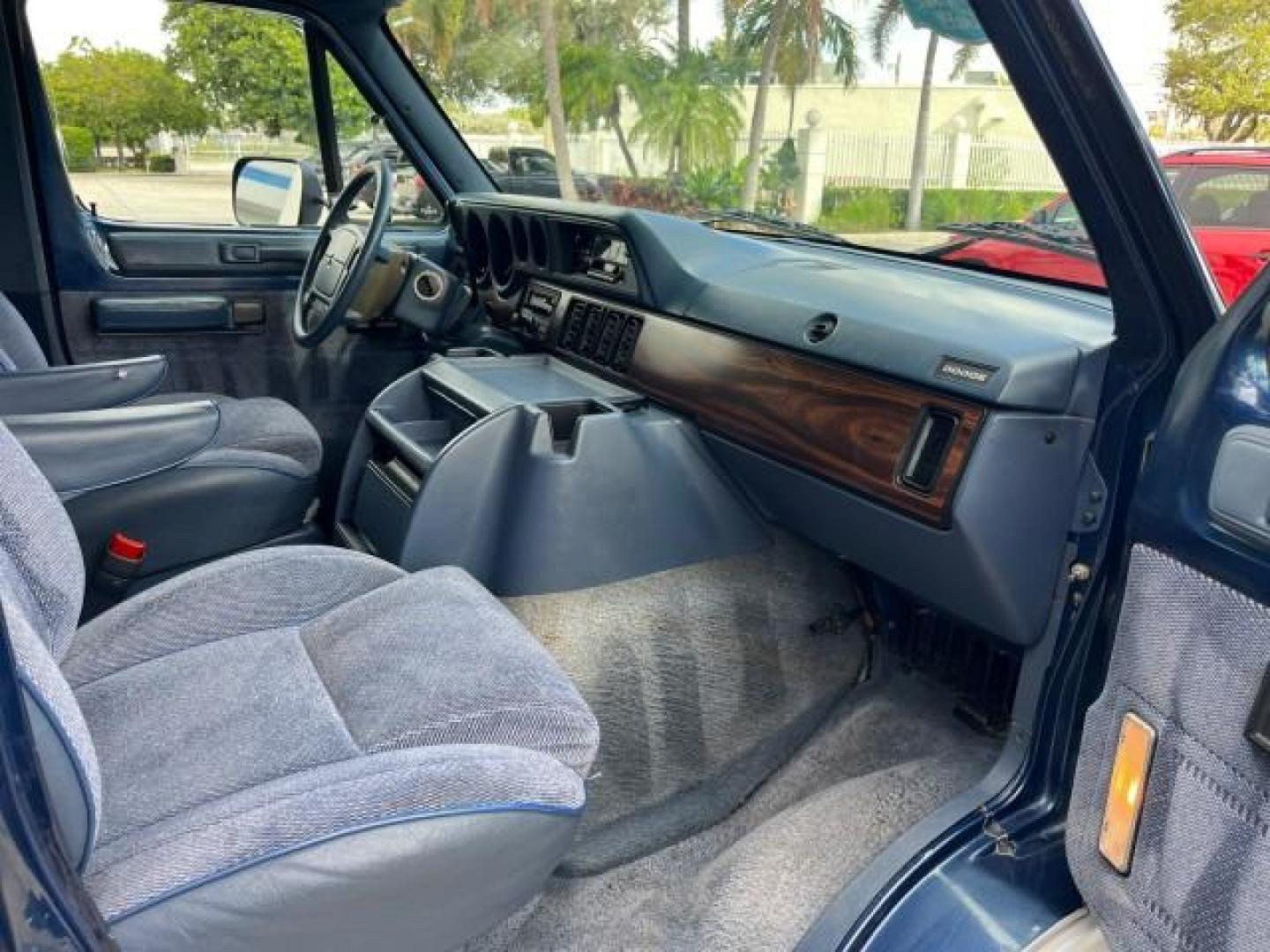 1995 BLUE /BLUE Dodge Ram Wagon EXT 15 PAS LOW MILES 69,523 (2B5WB35Z6SK) with an 5.9L MPI V8 Magnum Engine engine, Automatic transmission, located at 4701 North Dixie Hwy, Pompano Beach, FL, 33064, (954) 422-2889, 26.240938, -80.123474 - OUR WEBPAGE FLORIDACARS1.COM HAS OVER 100 PHOTOS AND FREE CARFAX LINK 1995 DODGE RAM VAN 3500 ROAD READY 5.9L V8 VIN: 2B5WB35Z6SK538547 NO ACCIDENTS VAN 15 PASSANGER 5.9L V8 F OHV 16V 4 ROW SEATS GASOLINE LOW MILES 69,523 REAR WHEEL DRIVE DUAL AC POWER MIRRORS Cloth Seats Running Boards Rear Air Con - Photo#26