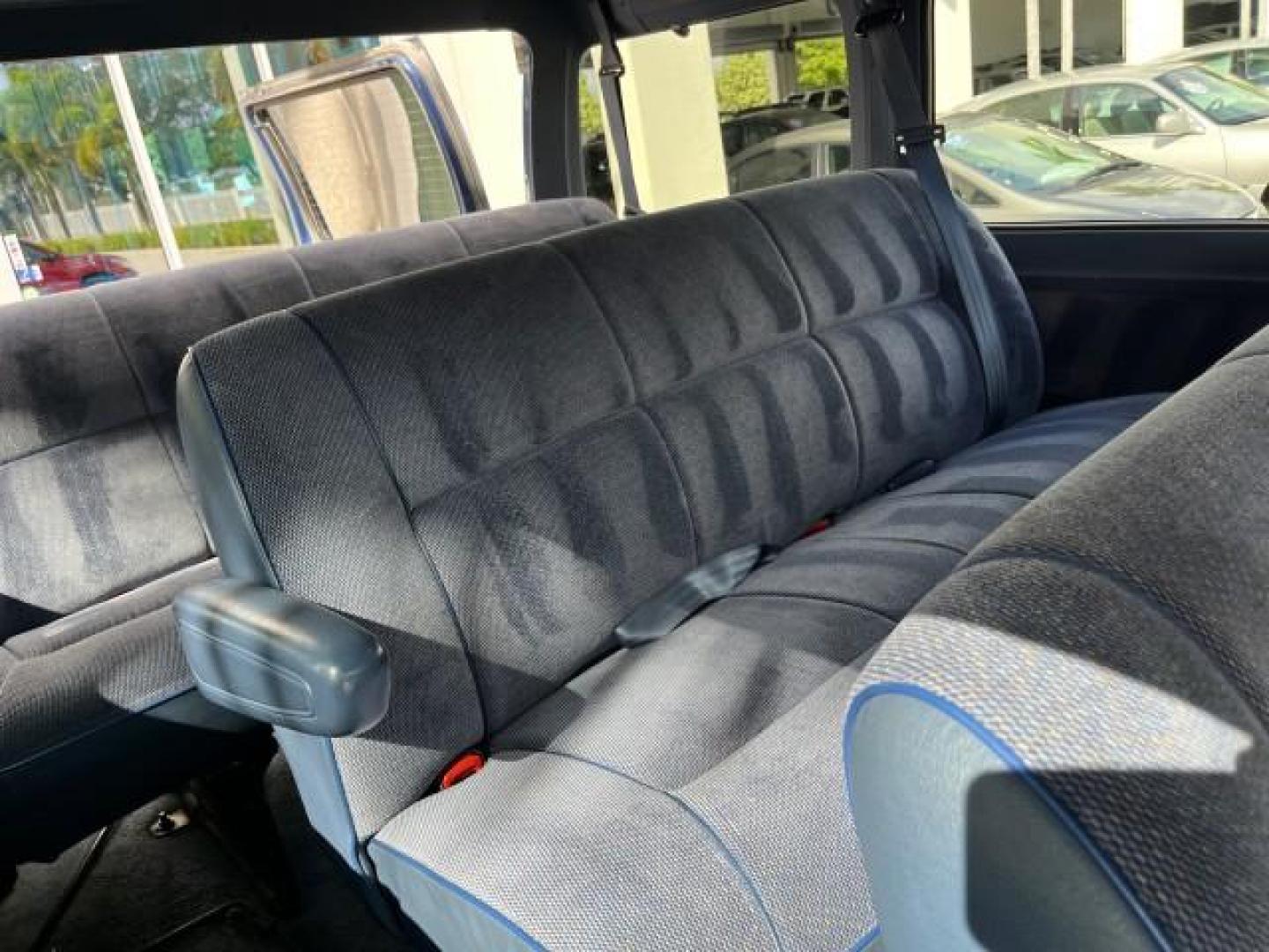 1995 BLUE /BLUE Dodge Ram Wagon EXT 15 PAS LOW MILES 69,523 (2B5WB35Z6SK) with an 5.9L MPI V8 Magnum Engine engine, Automatic transmission, located at 4701 North Dixie Hwy, Pompano Beach, FL, 33064, (954) 422-2889, 26.240938, -80.123474 - OUR WEBPAGE FLORIDACARS1.COM HAS OVER 100 PHOTOS AND FREE CARFAX LINK 1995 DODGE RAM VAN 3500 ROAD READY 5.9L V8 VIN: 2B5WB35Z6SK538547 NO ACCIDENTS VAN 15 PASSANGER 5.9L V8 F OHV 16V 4 ROW SEATS GASOLINE LOW MILES 69,523 REAR WHEEL DRIVE DUAL AC POWER MIRRORS Cloth Seats Running Boards Rear Air Con - Photo#48