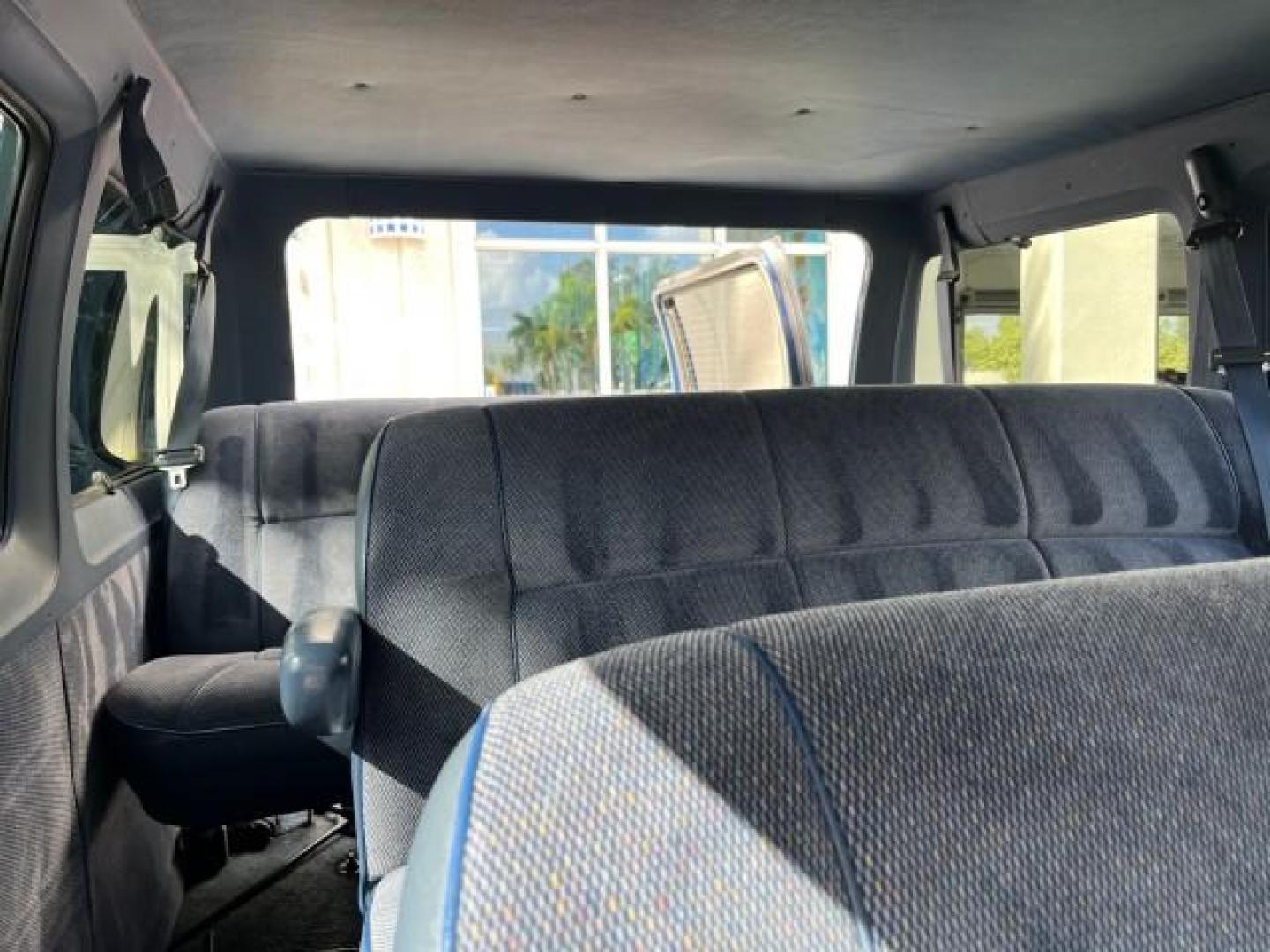 1995 BLUE /BLUE Dodge Ram Wagon EXT 15 PAS LOW MILES 69,523 (2B5WB35Z6SK) with an 5.9L MPI V8 Magnum Engine engine, Automatic transmission, located at 4701 North Dixie Hwy, Pompano Beach, FL, 33064, (954) 422-2889, 26.240938, -80.123474 - OUR WEBPAGE FLORIDACARS1.COM HAS OVER 100 PHOTOS AND FREE CARFAX LINK 1995 DODGE RAM VAN 3500 ROAD READY 5.9L V8 VIN: 2B5WB35Z6SK538547 NO ACCIDENTS VAN 15 PASSANGER 5.9L V8 F OHV 16V 4 ROW SEATS GASOLINE LOW MILES 69,523 REAR WHEEL DRIVE DUAL AC POWER MIRRORS Cloth Seats Running Boards Rear Air Con - Photo#49