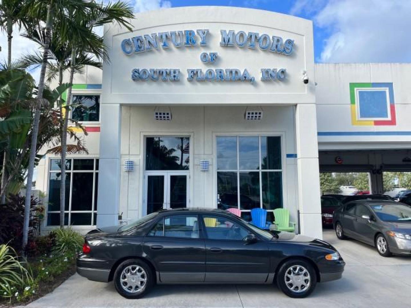 2003 Graphite Metallic /Medium Gray Buick Regal GS LOW MILES 34,898 SUPER CHARGED (2G4WF551031) with an 3.8L 3800 V6 SFI Supercharged Engine engine, Automatic transmission, located at 4701 North Dixie Hwy, Pompano Beach, FL, 33064, (954) 422-2889, 26.240938, -80.123474 - OUR WEBPAGE FLORIDACARS1.COM HAS OVER 100 PHOTOS AND FREE CARFAX LINK 2003 BUICK REGAL GS ROAD READY 3.8L V6 VIN: 2G4WF551031107030 NO ACCIDENTS 28 MPG SEDAN 4 DR NO RECALLS 1 OWNER 3.8L V6 F SUPER CHARGED VERY LOW MILES 34,898 GASOLINE POWER LEATHER SEATS FRONT WHEEL DRIVE SUPERCHARGED POWER SUNROO - Photo#0