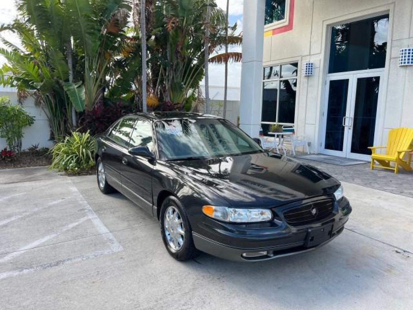 2003 Graphite Metallic /Medium Gray Buick Regal GS LOW MILES 34,898 SUPER CHARGED (2G4WF551031) with an 3.8L 3800 V6 SFI Supercharged Engine engine, Automatic transmission, located at 4701 North Dixie Hwy, Pompano Beach, FL, 33064, (954) 422-2889, 26.240938, -80.123474 - OUR WEBPAGE FLORIDACARS1.COM HAS OVER 100 PHOTOS AND FREE CARFAX LINK 2003 BUICK REGAL GS ROAD READY 3.8L V6 VIN: 2G4WF551031107030 NO ACCIDENTS 28 MPG SEDAN 4 DR NO RECALLS 1 OWNER 3.8L V6 F SUPER CHARGED VERY LOW MILES 34,898 GASOLINE POWER LEATHER SEATS FRONT WHEEL DRIVE SUPERCHARGED POWER SUNROO - Photo#1