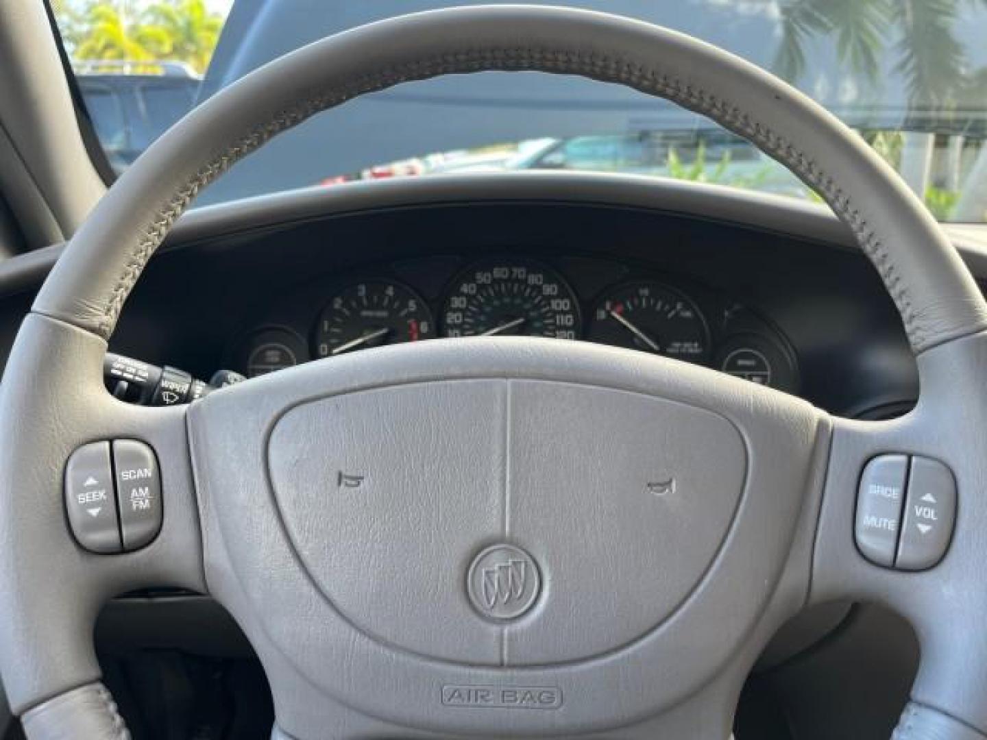 2003 Graphite Metallic /Medium Gray Buick Regal GS LOW MILES 34,898 SUPER CHARGED (2G4WF551031) with an 3.8L 3800 V6 SFI Supercharged Engine engine, Automatic transmission, located at 4701 North Dixie Hwy, Pompano Beach, FL, 33064, (954) 422-2889, 26.240938, -80.123474 - OUR WEBPAGE FLORIDACARS1.COM HAS OVER 100 PHOTOS AND FREE CARFAX LINK 2003 BUICK REGAL GS ROAD READY 3.8L V6 VIN: 2G4WF551031107030 NO ACCIDENTS 28 MPG SEDAN 4 DR NO RECALLS 1 OWNER 3.8L V6 F SUPER CHARGED VERY LOW MILES 34,898 GASOLINE POWER LEATHER SEATS FRONT WHEEL DRIVE SUPERCHARGED POWER SUNROO - Photo#49