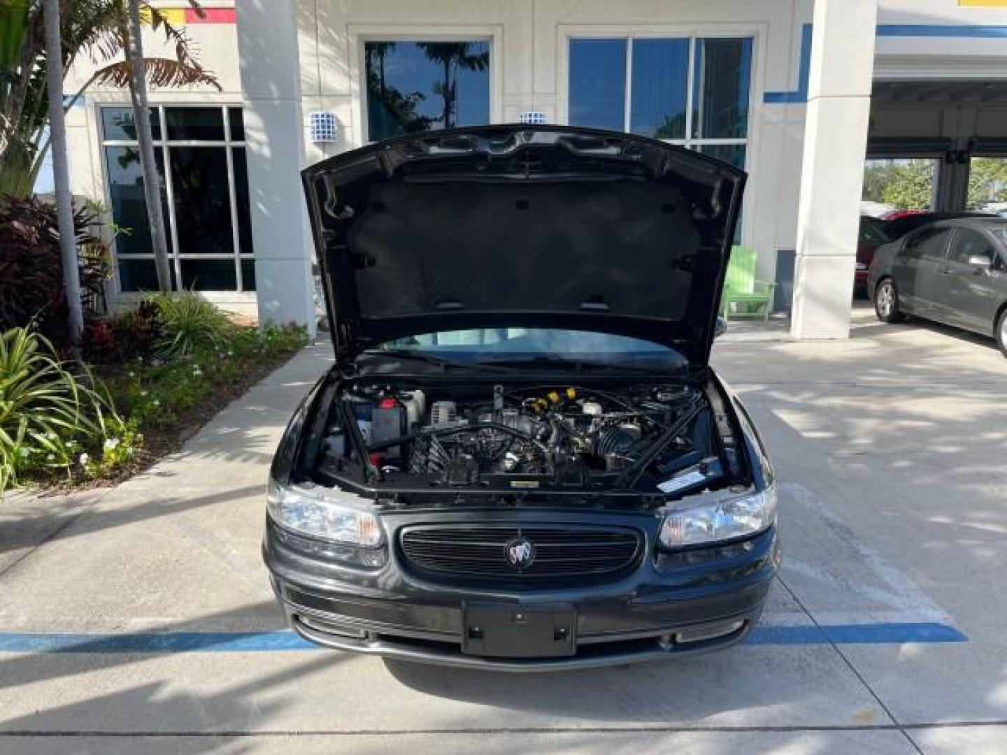 2003 Graphite Metallic /Medium Gray Buick Regal GS LOW MILES 34,898 SUPER CHARGED (2G4WF551031) with an 3.8L 3800 V6 SFI Supercharged Engine engine, Automatic transmission, located at 4701 North Dixie Hwy, Pompano Beach, FL, 33064, (954) 422-2889, 26.240938, -80.123474 - OUR WEBPAGE FLORIDACARS1.COM HAS OVER 100 PHOTOS AND FREE CARFAX LINK 2003 BUICK REGAL GS ROAD READY 3.8L V6 VIN: 2G4WF551031107030 NO ACCIDENTS 28 MPG SEDAN 4 DR NO RECALLS 1 OWNER 3.8L V6 F SUPER CHARGED VERY LOW MILES 34,898 GASOLINE POWER LEATHER SEATS FRONT WHEEL DRIVE SUPERCHARGED POWER SUNROO - Photo#70