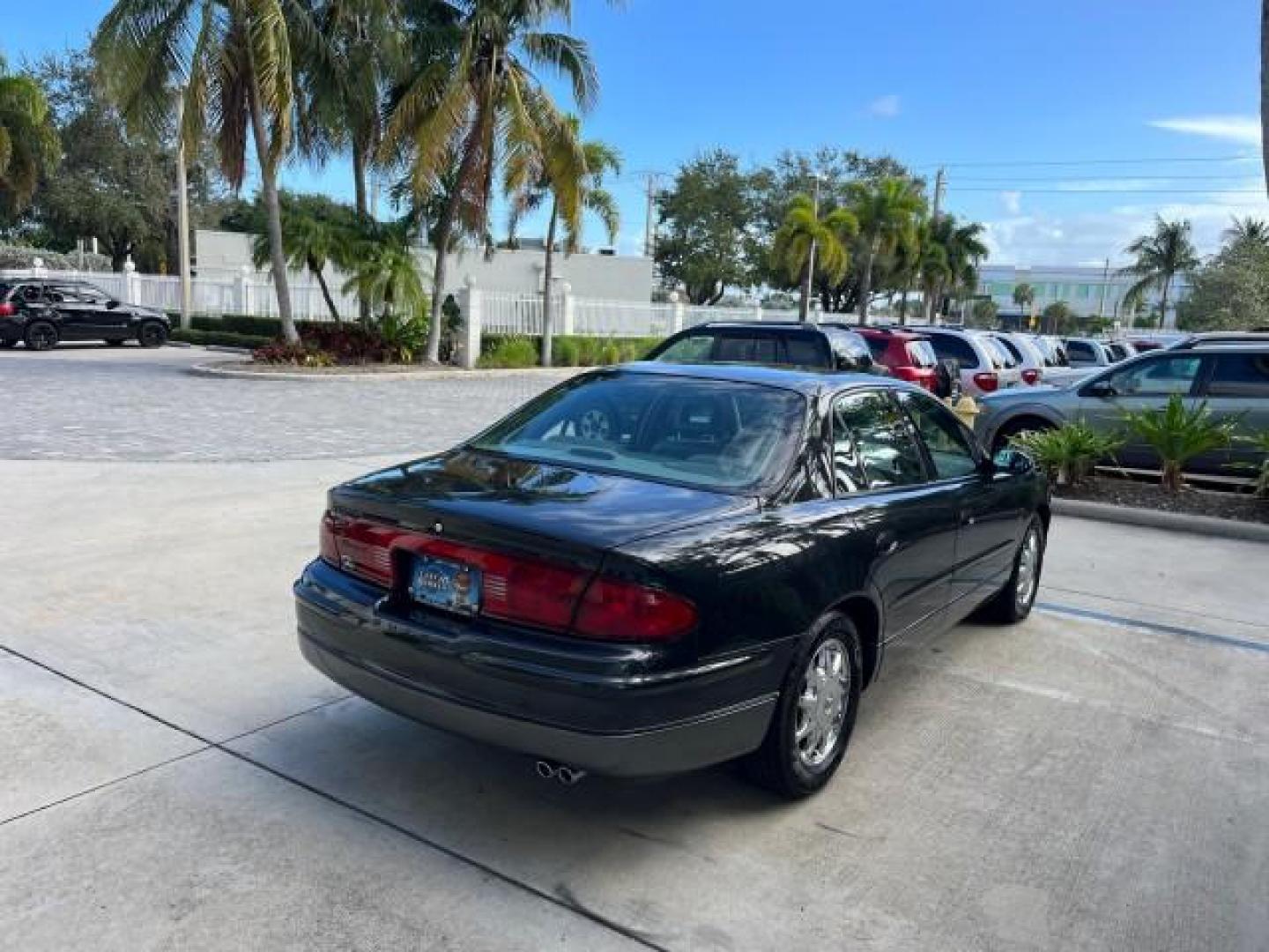 2003 Graphite Metallic /Medium Gray Buick Regal GS LOW MILES 34,898 SUPER CHARGED (2G4WF551031) with an 3.8L 3800 V6 SFI Supercharged Engine engine, Automatic transmission, located at 4701 North Dixie Hwy, Pompano Beach, FL, 33064, (954) 422-2889, 26.240938, -80.123474 - OUR WEBPAGE FLORIDACARS1.COM HAS OVER 100 PHOTOS AND FREE CARFAX LINK 2003 BUICK REGAL GS ROAD READY 3.8L V6 VIN: 2G4WF551031107030 NO ACCIDENTS 28 MPG SEDAN 4 DR NO RECALLS 1 OWNER 3.8L V6 F SUPER CHARGED VERY LOW MILES 34,898 GASOLINE POWER LEATHER SEATS FRONT WHEEL DRIVE SUPERCHARGED POWER SUNROO - Photo#7