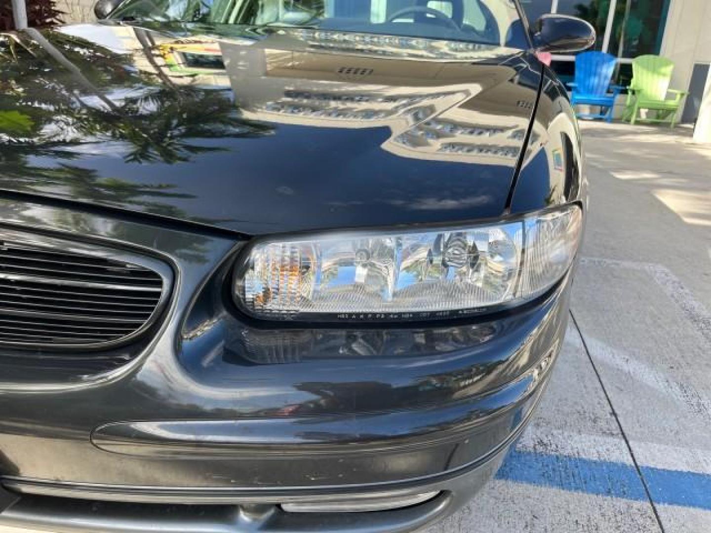 2003 Graphite Metallic /Medium Gray Buick Regal GS LOW MILES 34,898 SUPER CHARGED (2G4WF551031) with an 3.8L 3800 V6 SFI Supercharged Engine engine, Automatic transmission, located at 4701 North Dixie Hwy, Pompano Beach, FL, 33064, (954) 422-2889, 26.240938, -80.123474 - OUR WEBPAGE FLORIDACARS1.COM HAS OVER 100 PHOTOS AND FREE CARFAX LINK 2003 BUICK REGAL GS ROAD READY 3.8L V6 VIN: 2G4WF551031107030 NO ACCIDENTS 28 MPG SEDAN 4 DR NO RECALLS 1 OWNER 3.8L V6 F SUPER CHARGED VERY LOW MILES 34,898 GASOLINE POWER LEATHER SEATS FRONT WHEEL DRIVE SUPERCHARGED POWER SUNROO - Photo#82