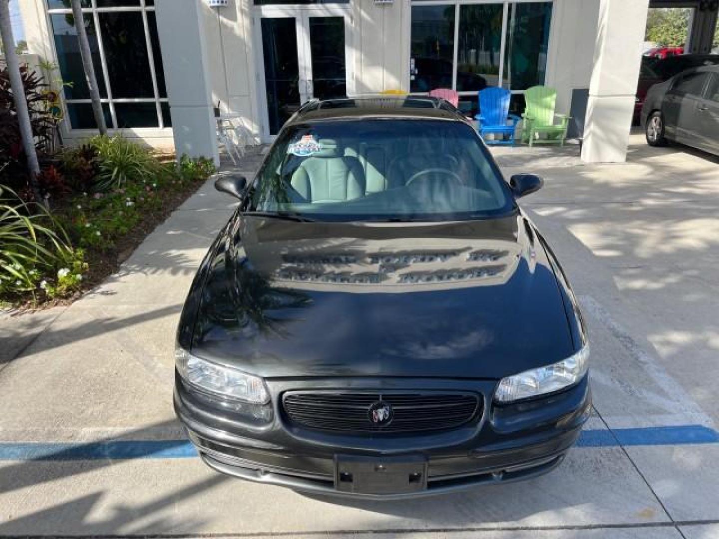 2003 Graphite Metallic /Medium Gray Buick Regal GS LOW MILES 34,898 SUPER CHARGED (2G4WF551031) with an 3.8L 3800 V6 SFI Supercharged Engine engine, Automatic transmission, located at 4701 North Dixie Hwy, Pompano Beach, FL, 33064, (954) 422-2889, 26.240938, -80.123474 - OUR WEBPAGE FLORIDACARS1.COM HAS OVER 100 PHOTOS AND FREE CARFAX LINK 2003 BUICK REGAL GS ROAD READY 3.8L V6 VIN: 2G4WF551031107030 NO ACCIDENTS 28 MPG SEDAN 4 DR NO RECALLS 1 OWNER 3.8L V6 F SUPER CHARGED VERY LOW MILES 34,898 GASOLINE POWER LEATHER SEATS FRONT WHEEL DRIVE SUPERCHARGED POWER SUNROO - Photo#87