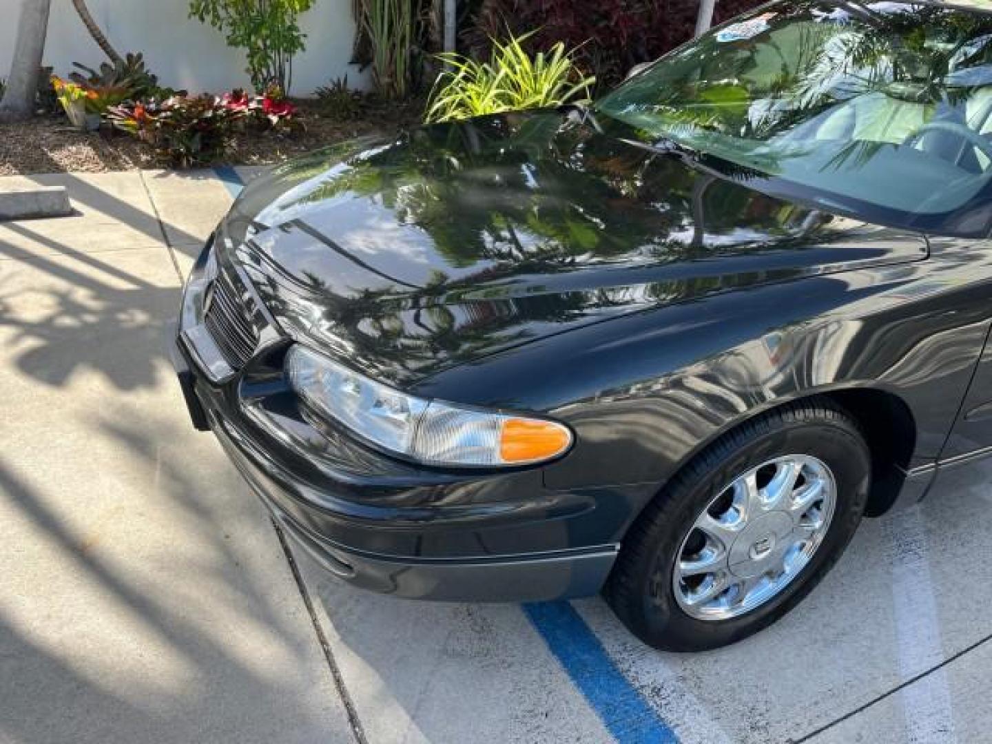 2003 Graphite Metallic /Medium Gray Buick Regal GS LOW MILES 34,898 SUPER CHARGED (2G4WF551031) with an 3.8L 3800 V6 SFI Supercharged Engine engine, Automatic transmission, located at 4701 North Dixie Hwy, Pompano Beach, FL, 33064, (954) 422-2889, 26.240938, -80.123474 - OUR WEBPAGE FLORIDACARS1.COM HAS OVER 100 PHOTOS AND FREE CARFAX LINK 2003 BUICK REGAL GS ROAD READY 3.8L V6 VIN: 2G4WF551031107030 NO ACCIDENTS 28 MPG SEDAN 4 DR NO RECALLS 1 OWNER 3.8L V6 F SUPER CHARGED VERY LOW MILES 34,898 GASOLINE POWER LEATHER SEATS FRONT WHEEL DRIVE SUPERCHARGED POWER SUNROO - Photo#90