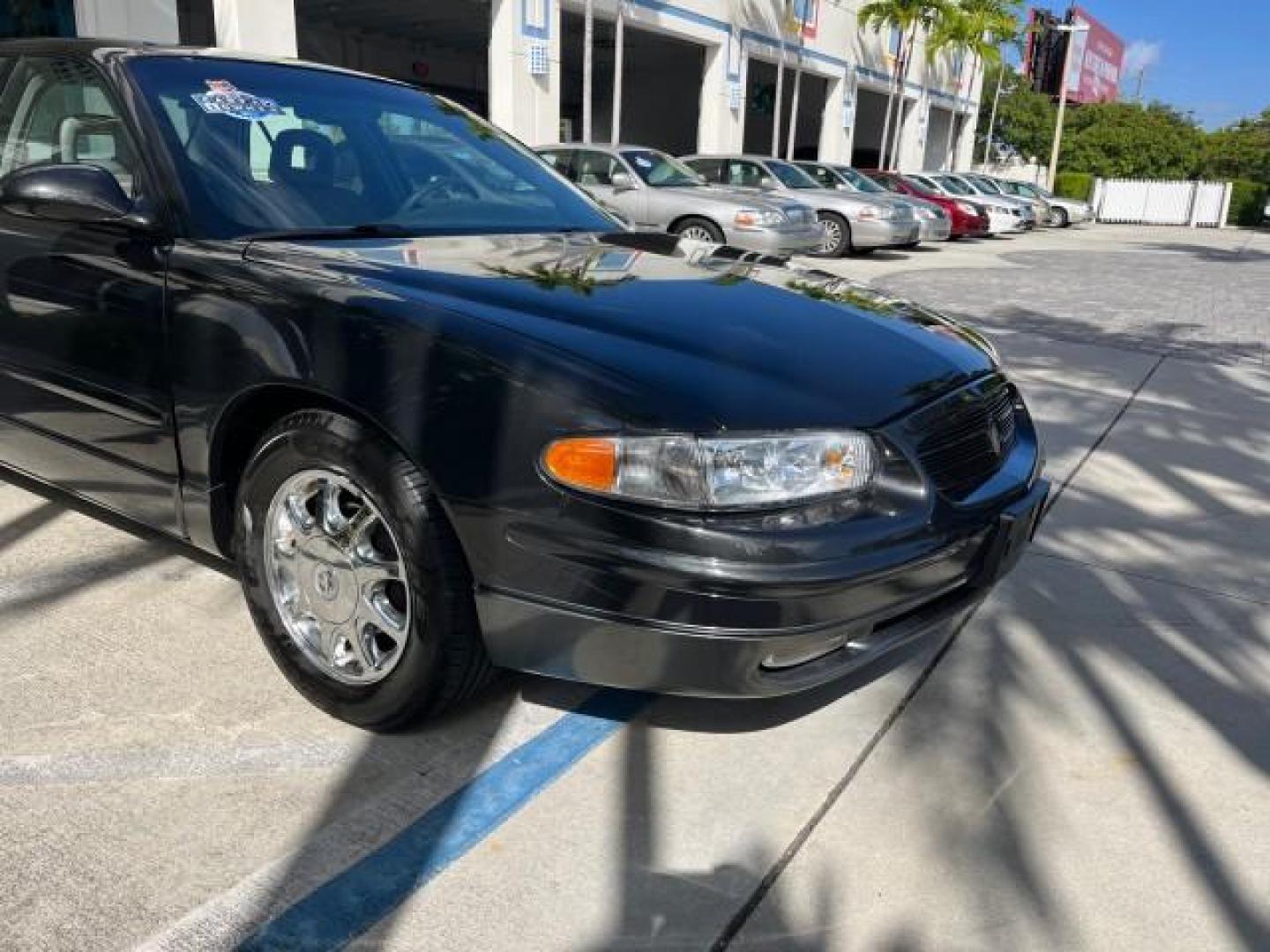 2003 Graphite Metallic /Medium Gray Buick Regal GS LOW MILES 34,898 SUPER CHARGED (2G4WF551031) with an 3.8L 3800 V6 SFI Supercharged Engine engine, Automatic transmission, located at 4701 North Dixie Hwy, Pompano Beach, FL, 33064, (954) 422-2889, 26.240938, -80.123474 - OUR WEBPAGE FLORIDACARS1.COM HAS OVER 100 PHOTOS AND FREE CARFAX LINK 2003 BUICK REGAL GS ROAD READY 3.8L V6 VIN: 2G4WF551031107030 NO ACCIDENTS 28 MPG SEDAN 4 DR NO RECALLS 1 OWNER 3.8L V6 F SUPER CHARGED VERY LOW MILES 34,898 GASOLINE POWER LEATHER SEATS FRONT WHEEL DRIVE SUPERCHARGED POWER SUNROO - Photo#91